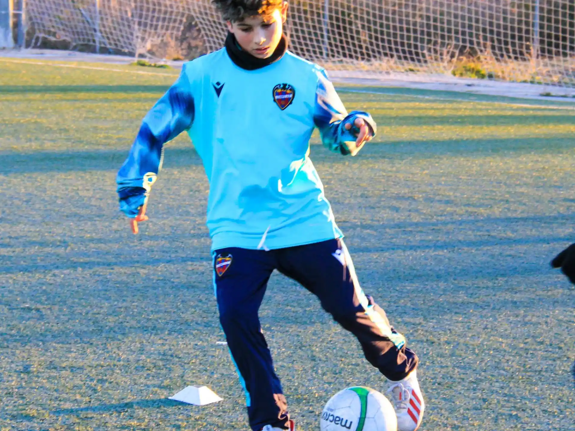 a girl playing football