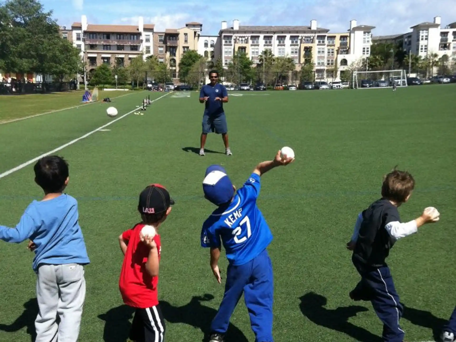 a group of kids playing football