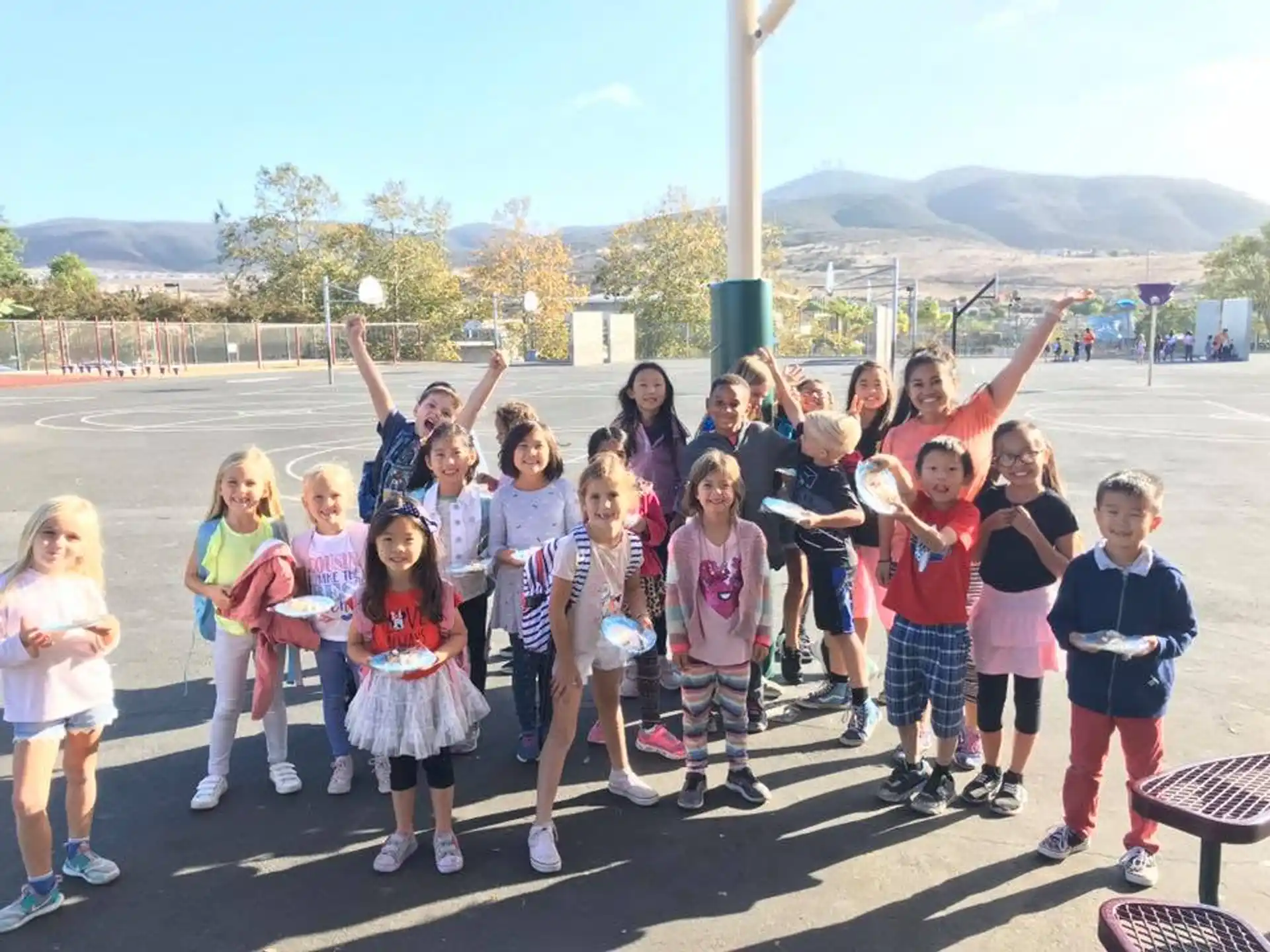 a group of children posing for a photo