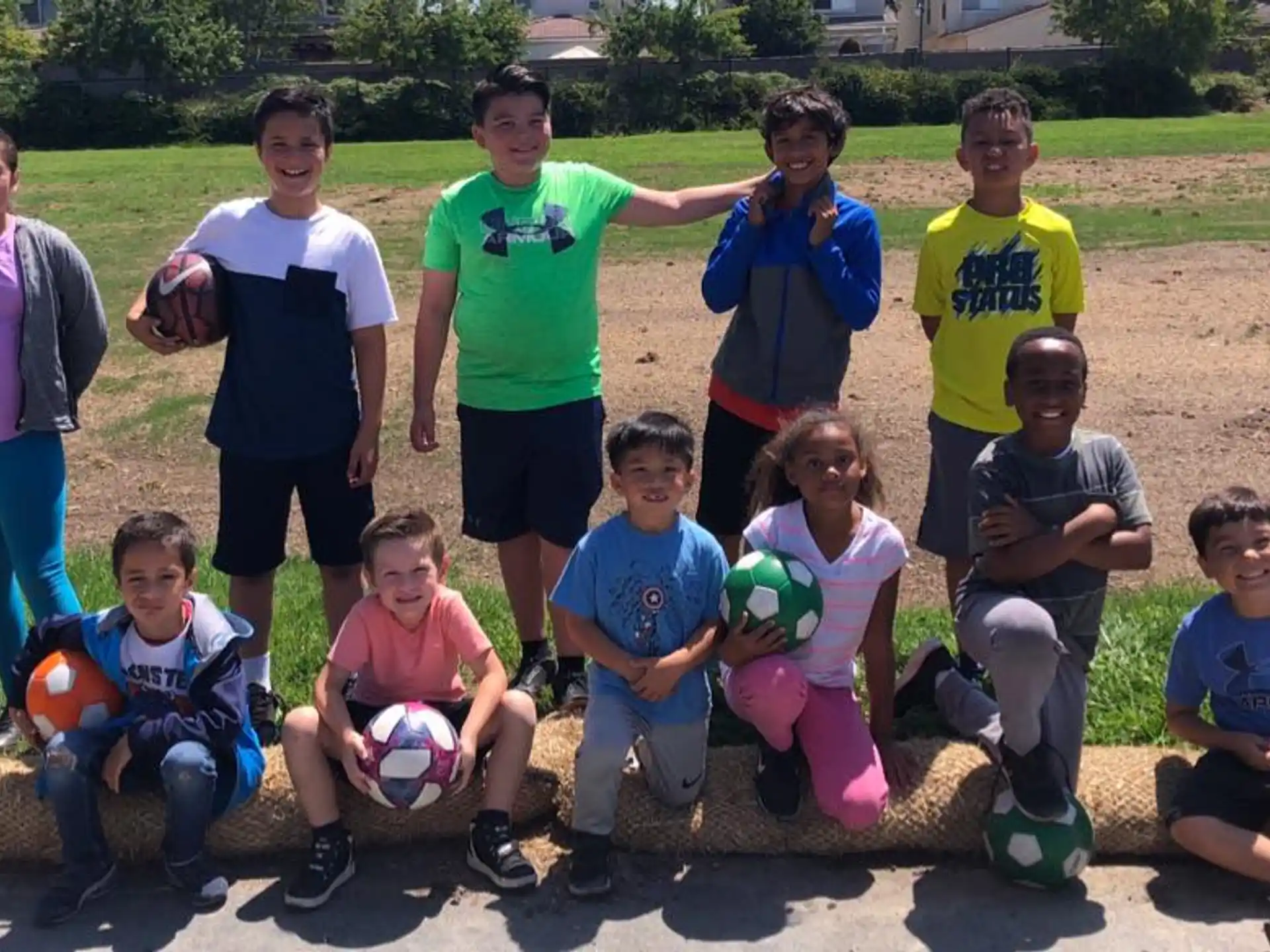 a group of kids posing for a picture