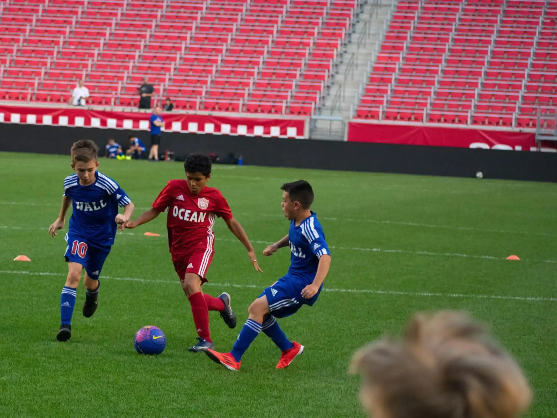 a group of boys playing football