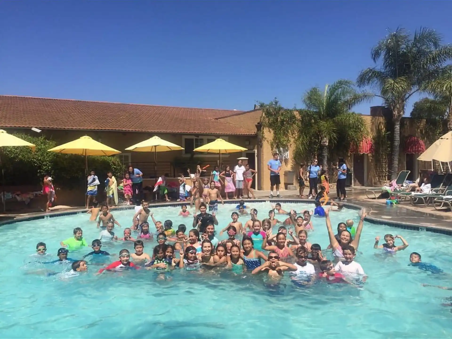 a group of people in a pool