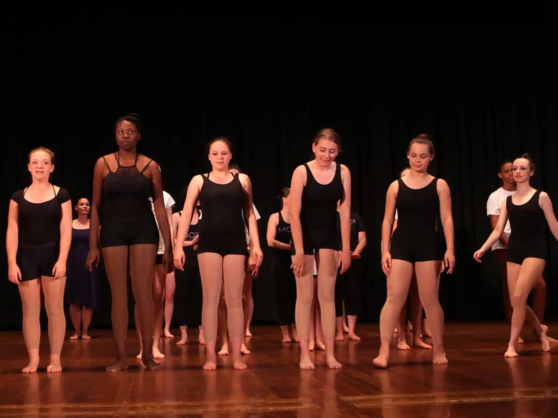 a group of women on a stage