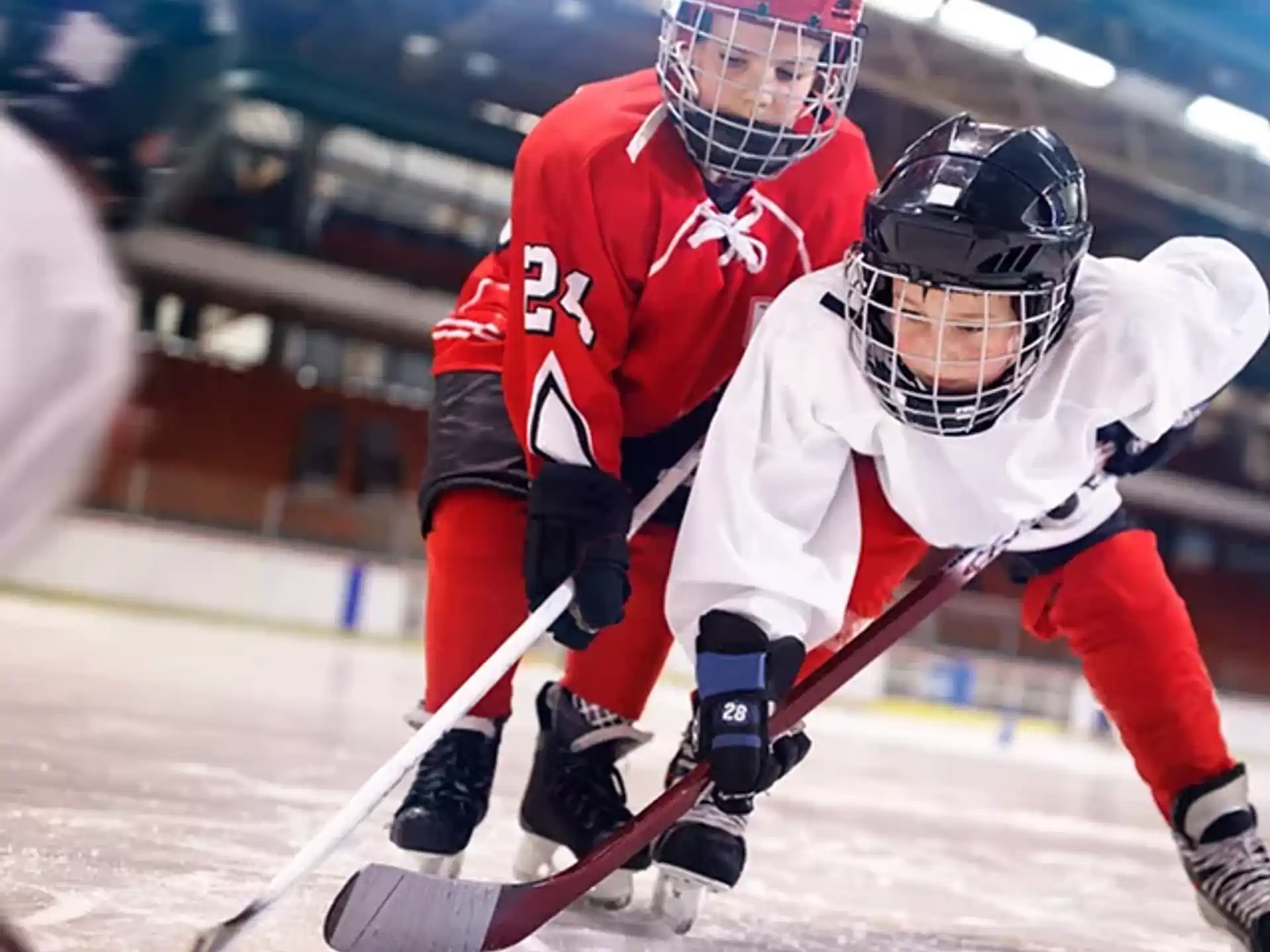 two men playing hockey
