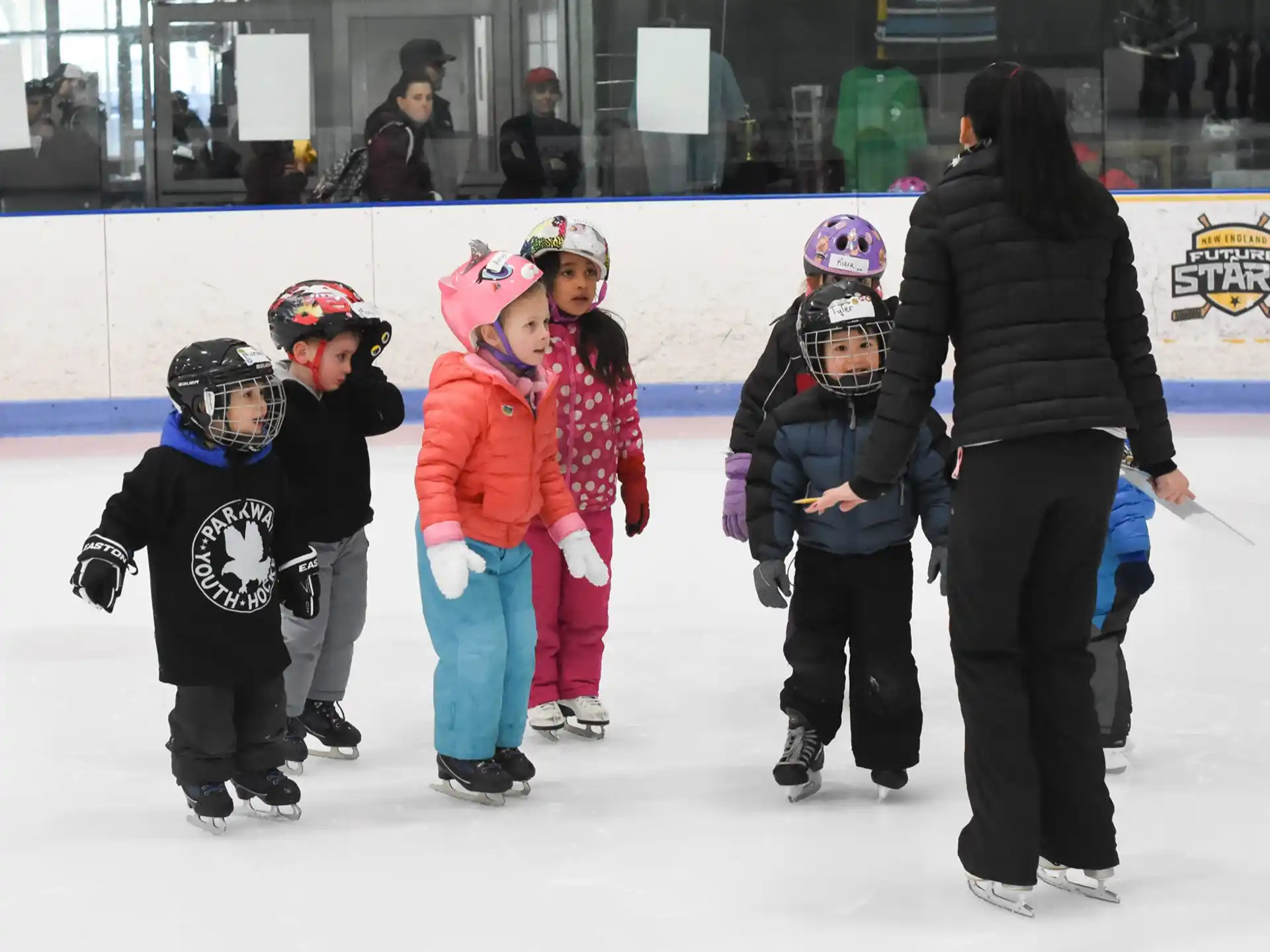 a group of kids on ice