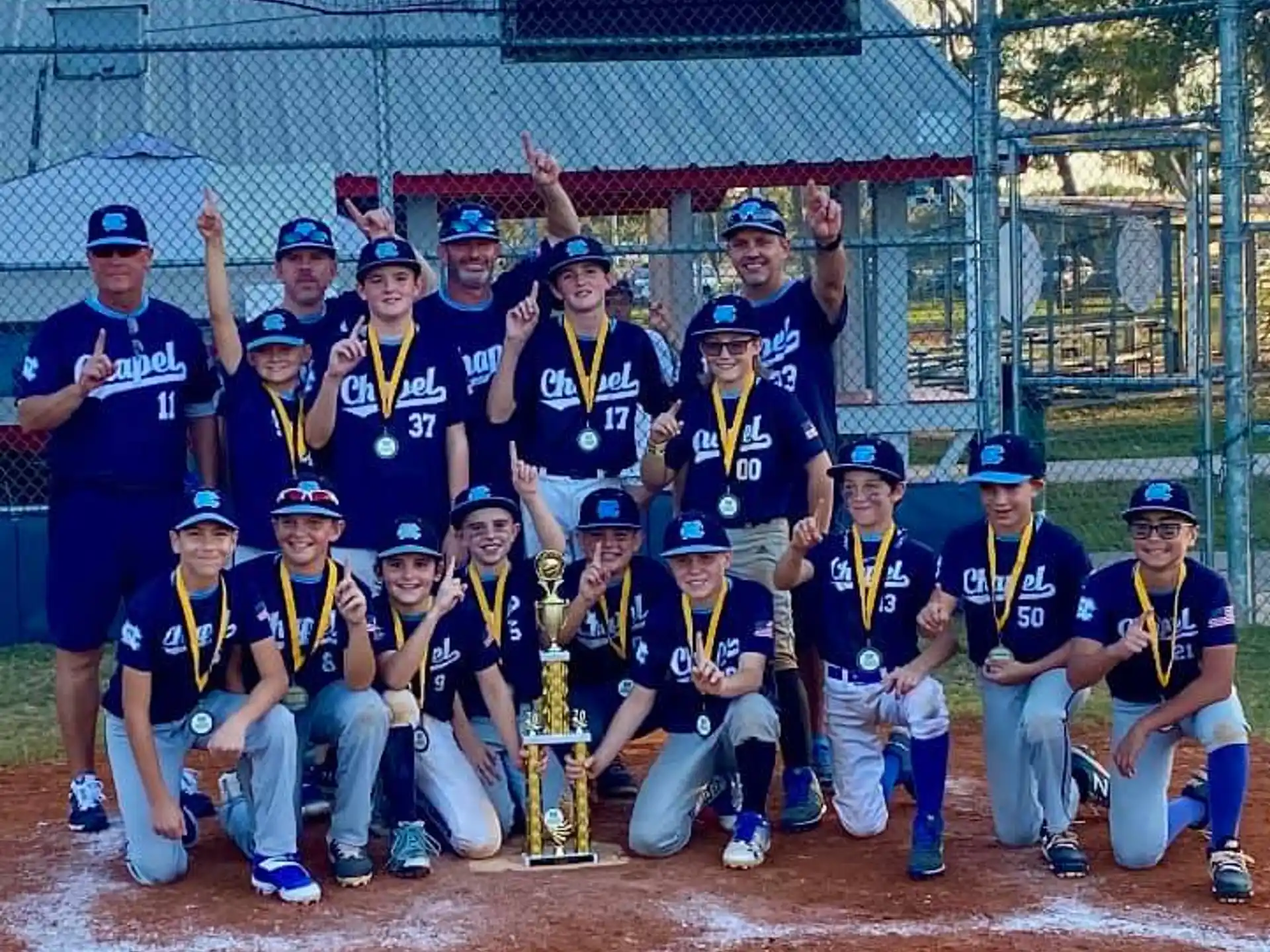 a group of baseball players posing for a photo