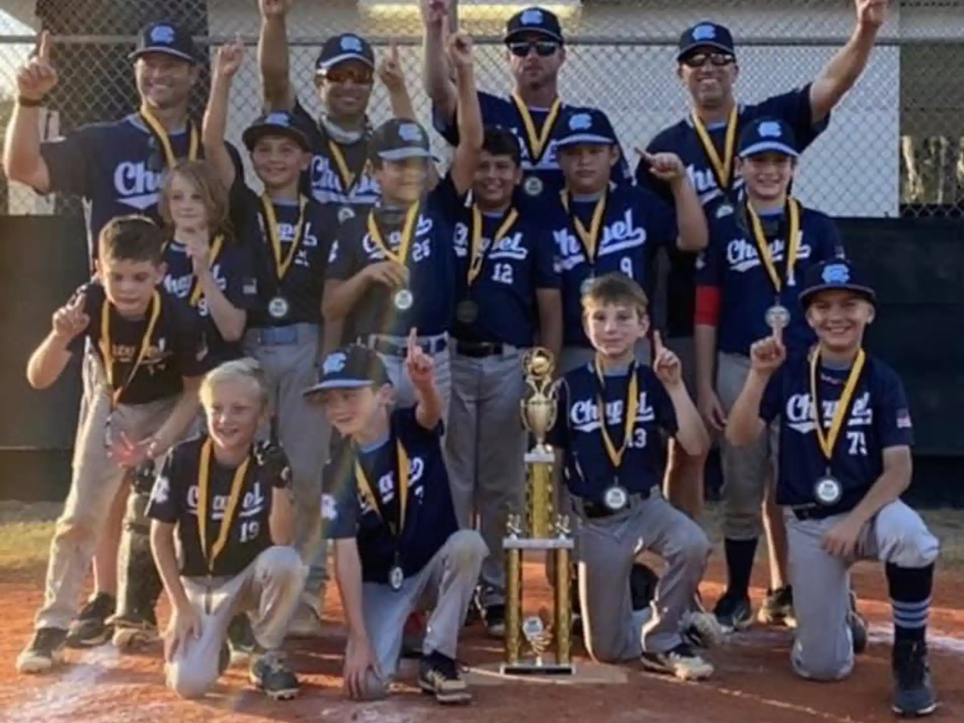 a group of baseball players posing for a photo