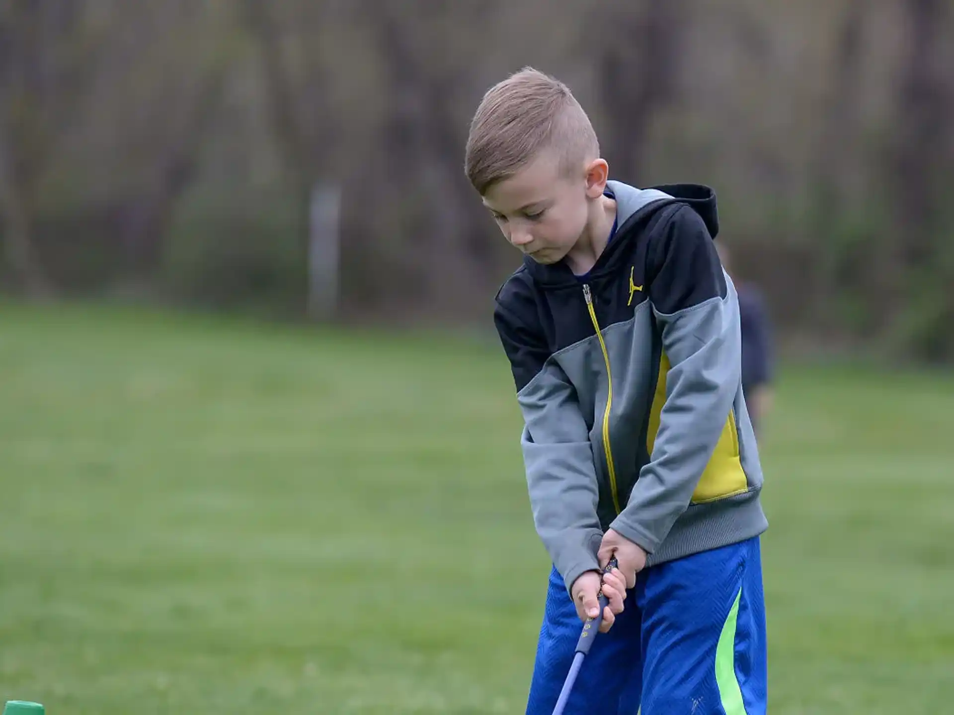 a boy in a field