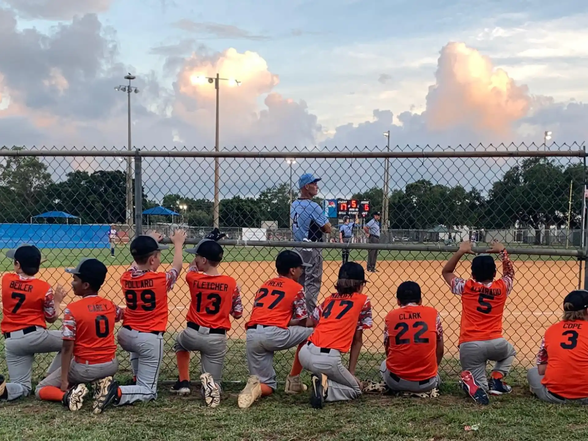 a group of baseball players posing for a photo