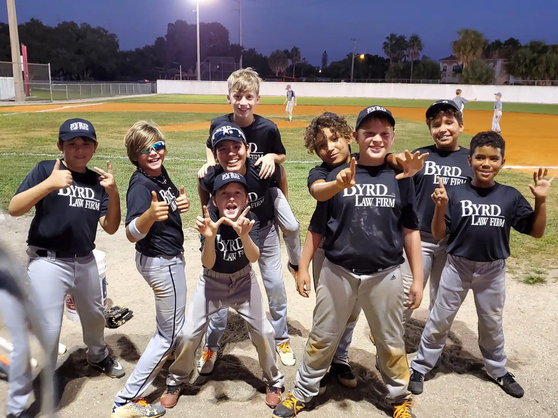 a group of kids posing for a photo