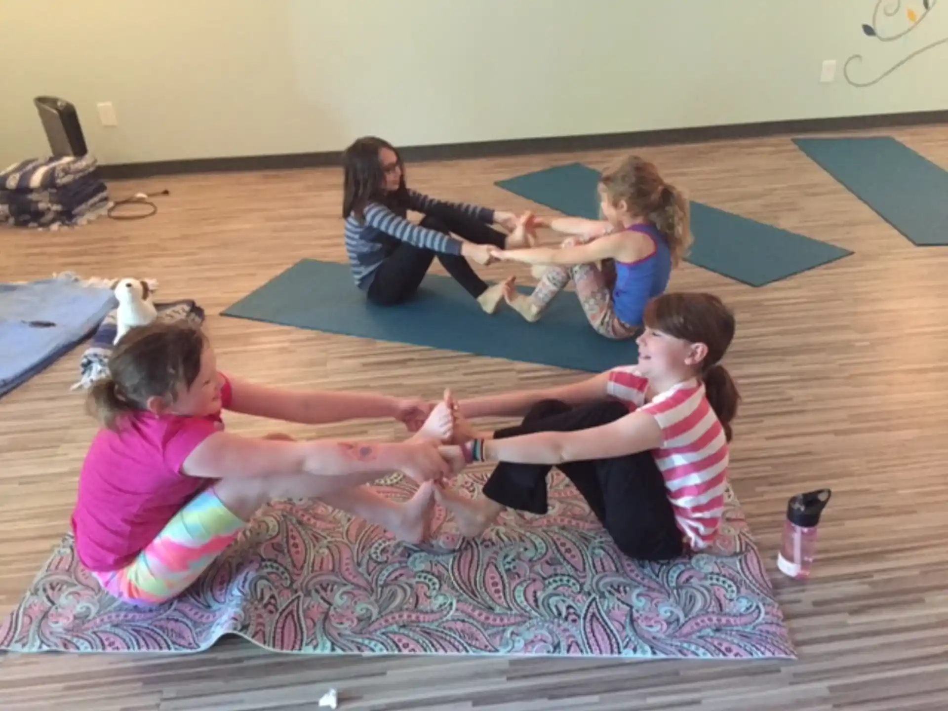 a group of people sitting on the floor