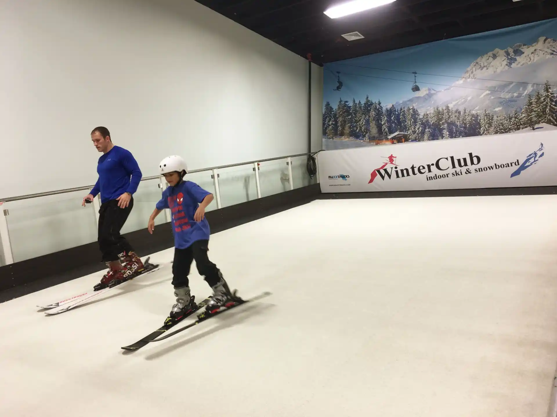 a man and a boy skiing