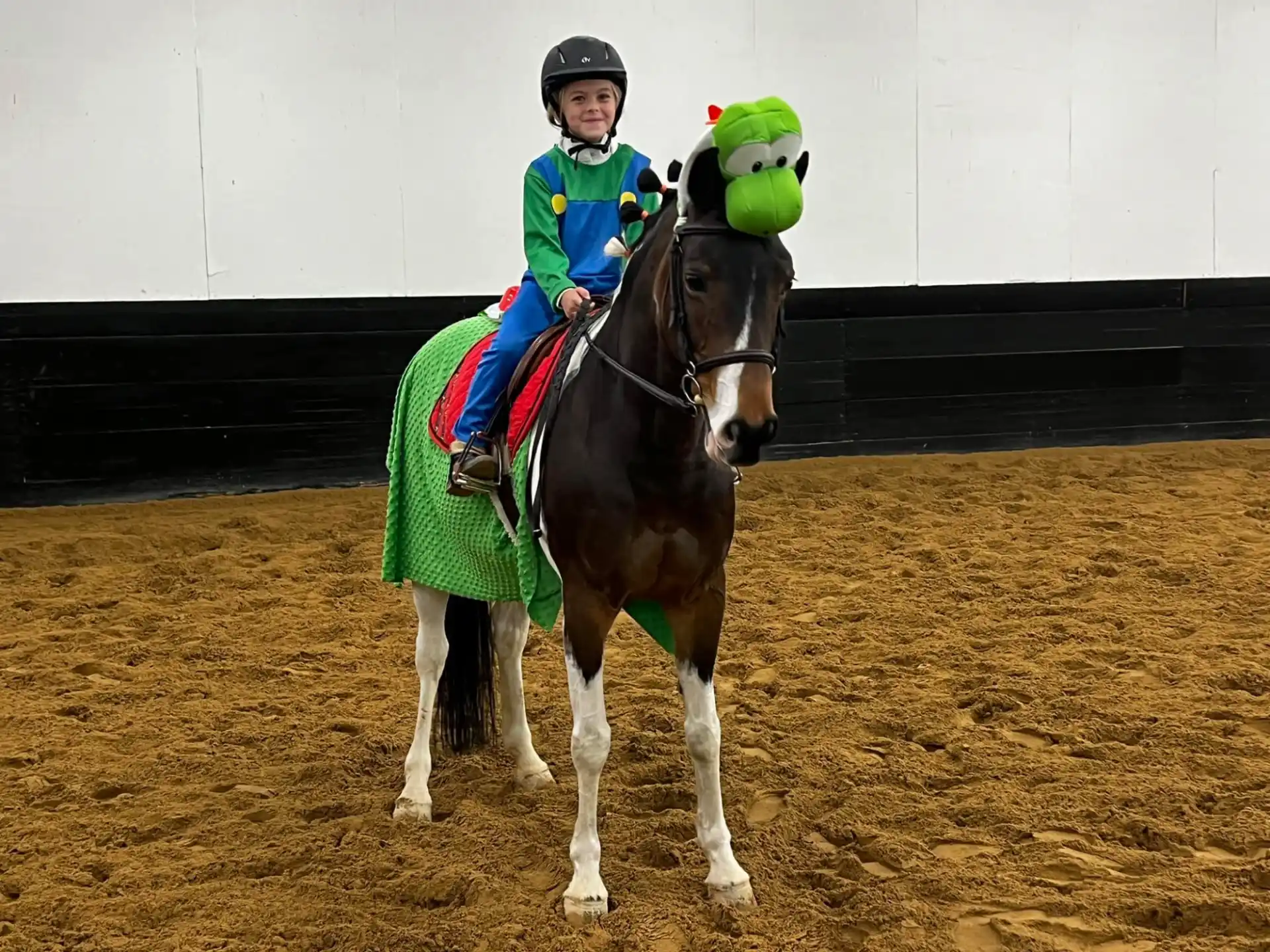 a couple of people riding horses