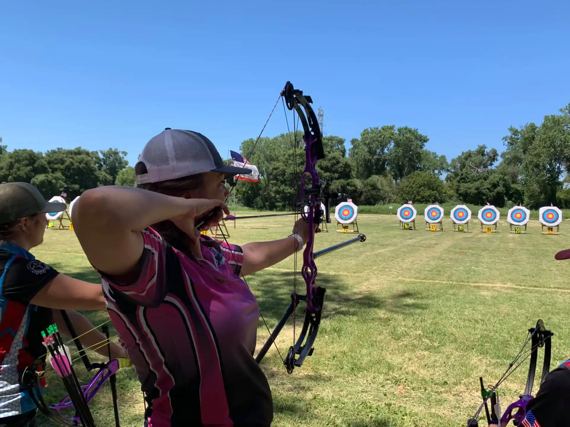 a person playing a bow and arrow