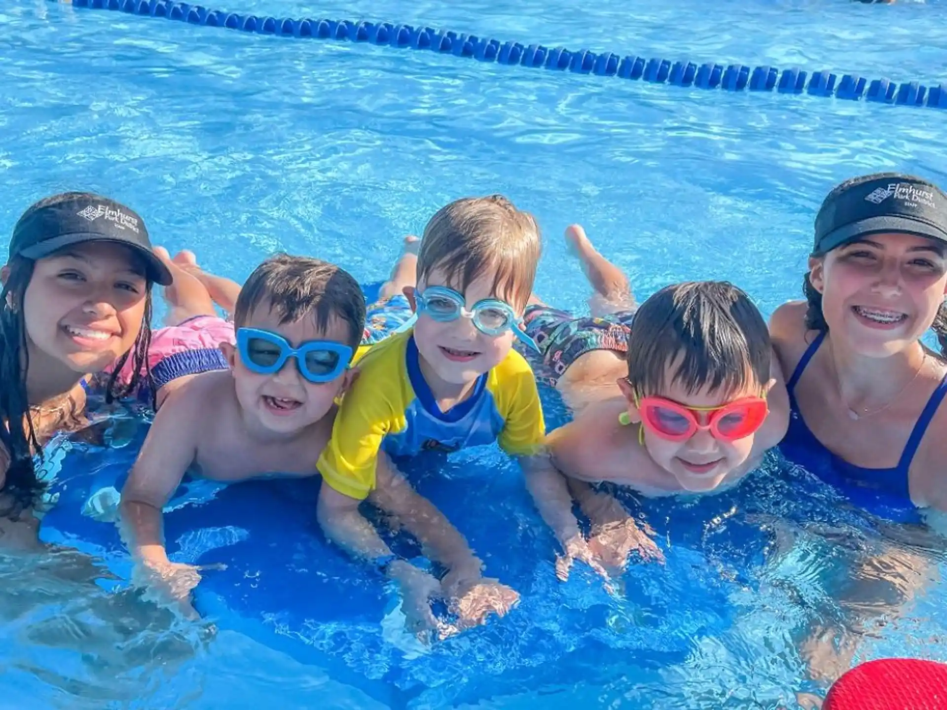 a group of people in a pool