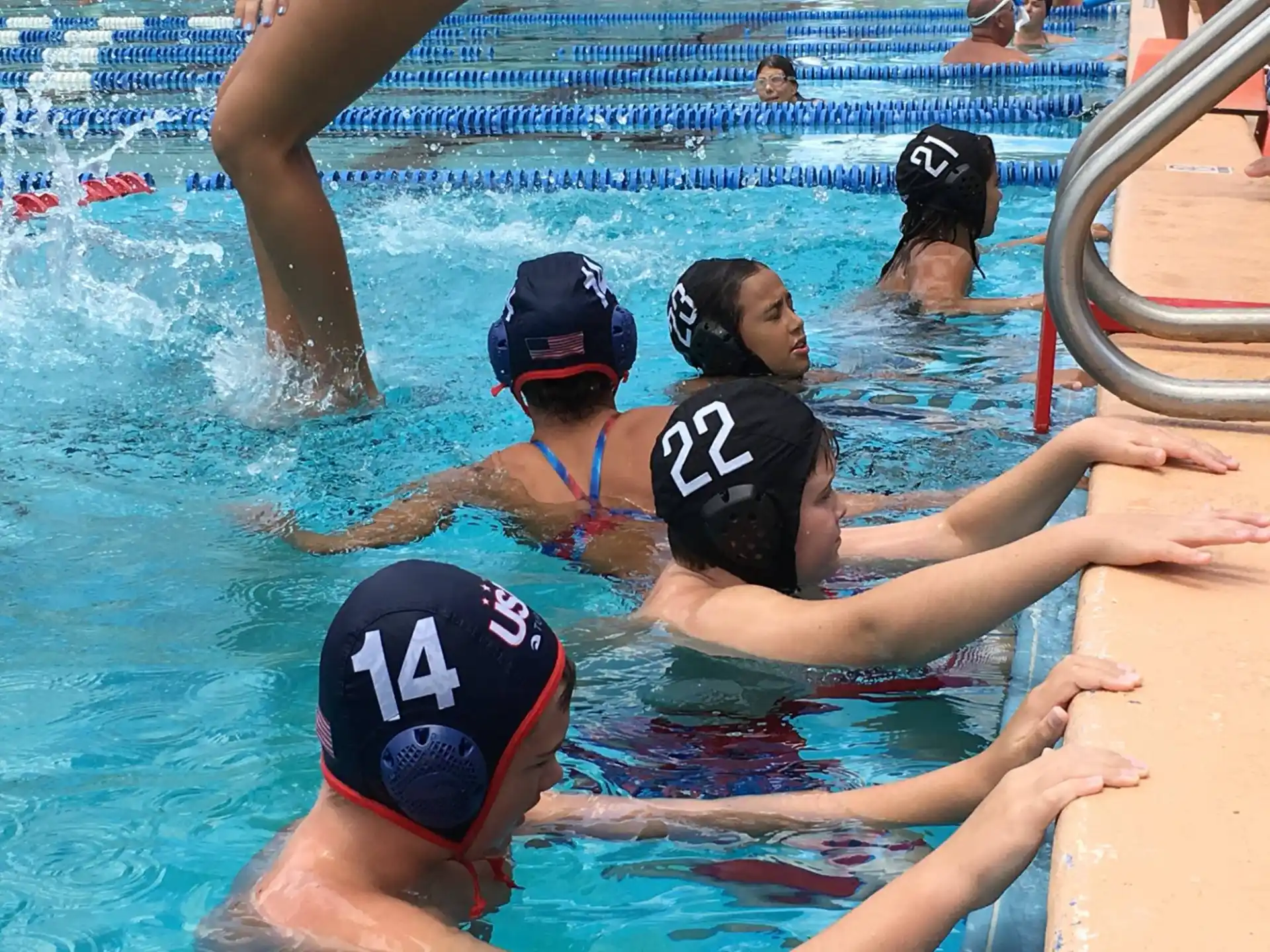 a group of people in a pool