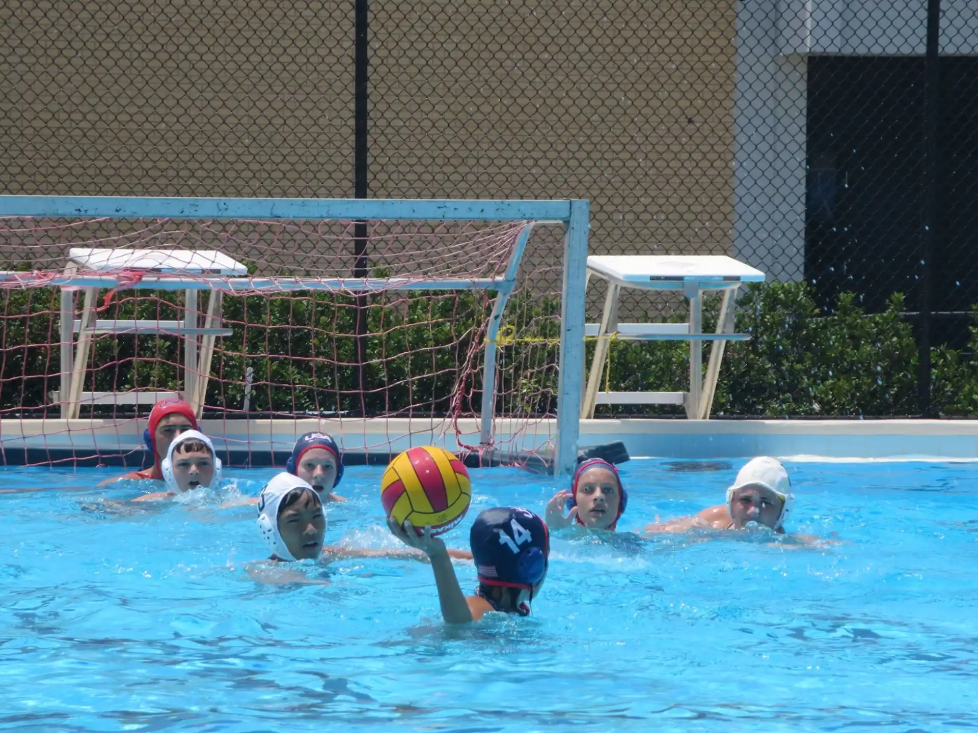 a group of people playing water polo