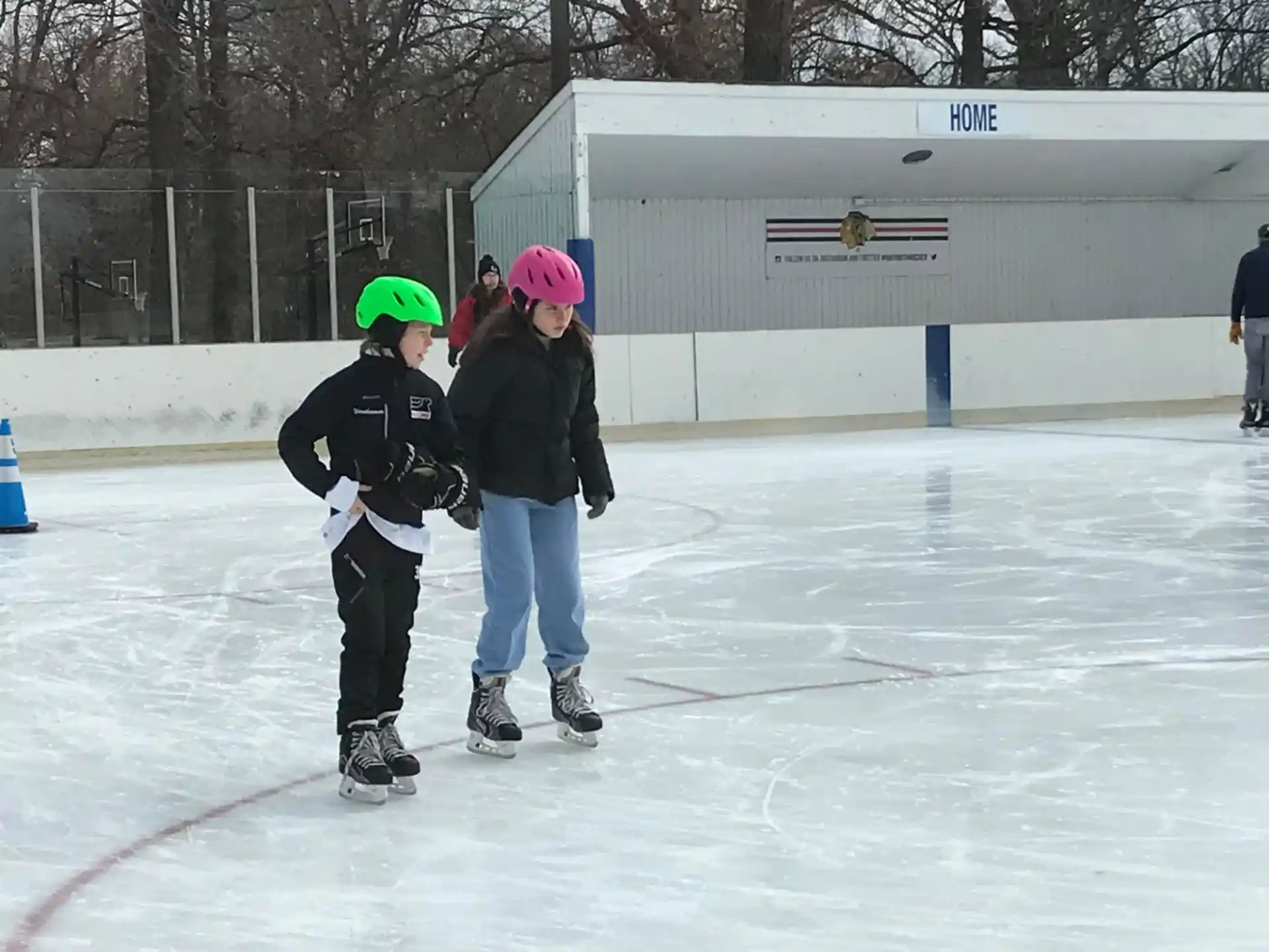 a couple of girls on ice