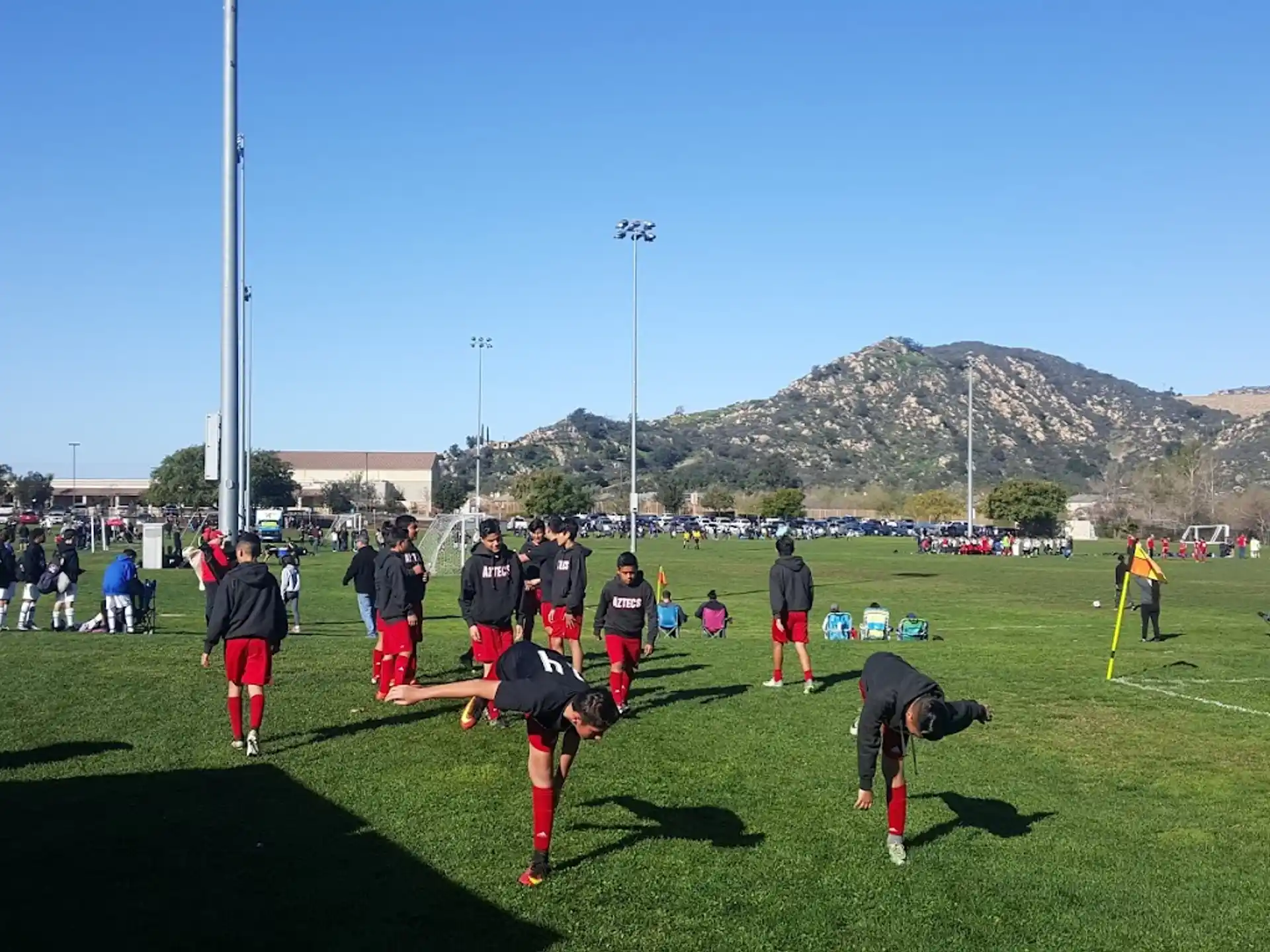 a group of people playing football