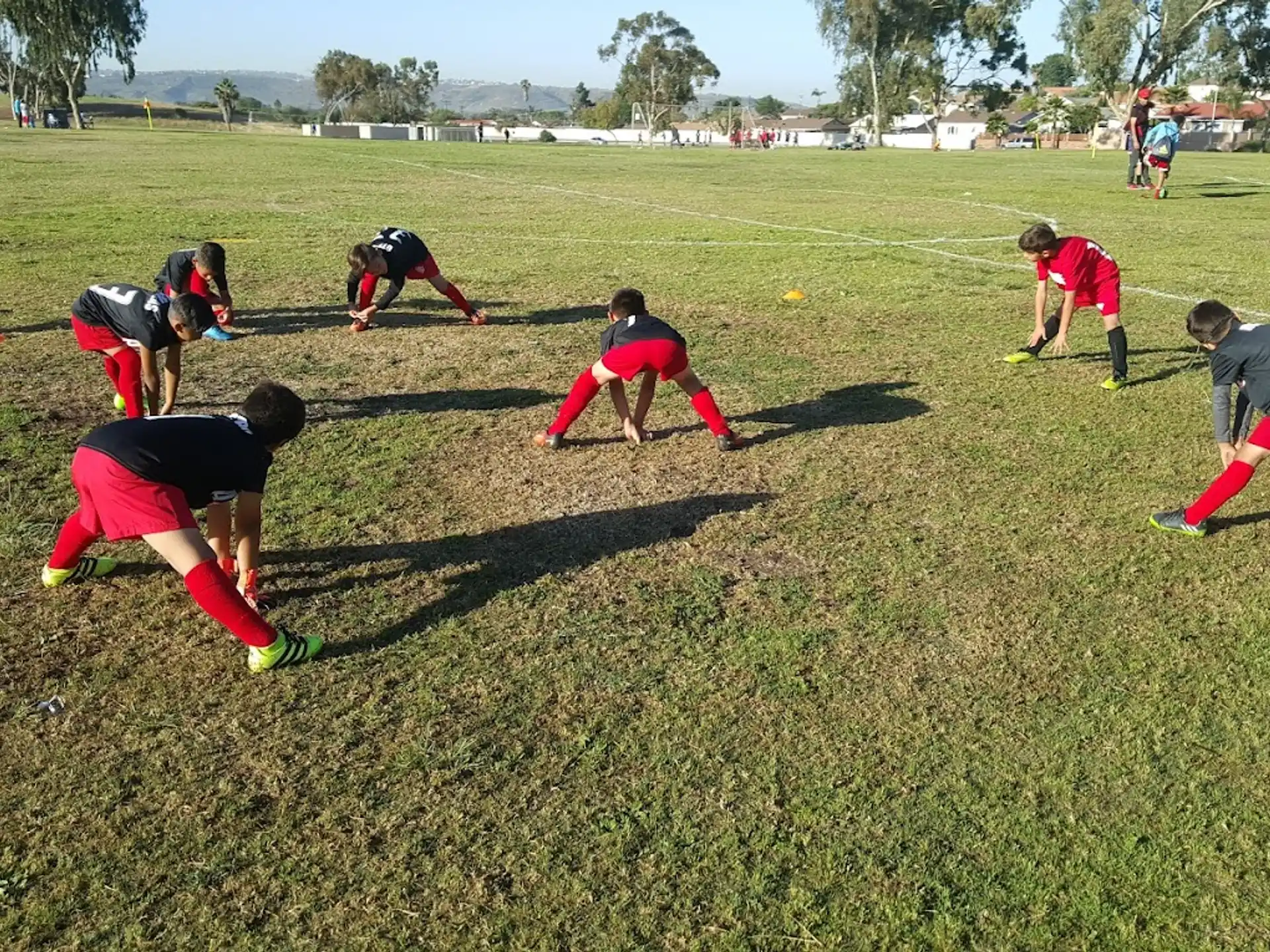 a group of people playing football