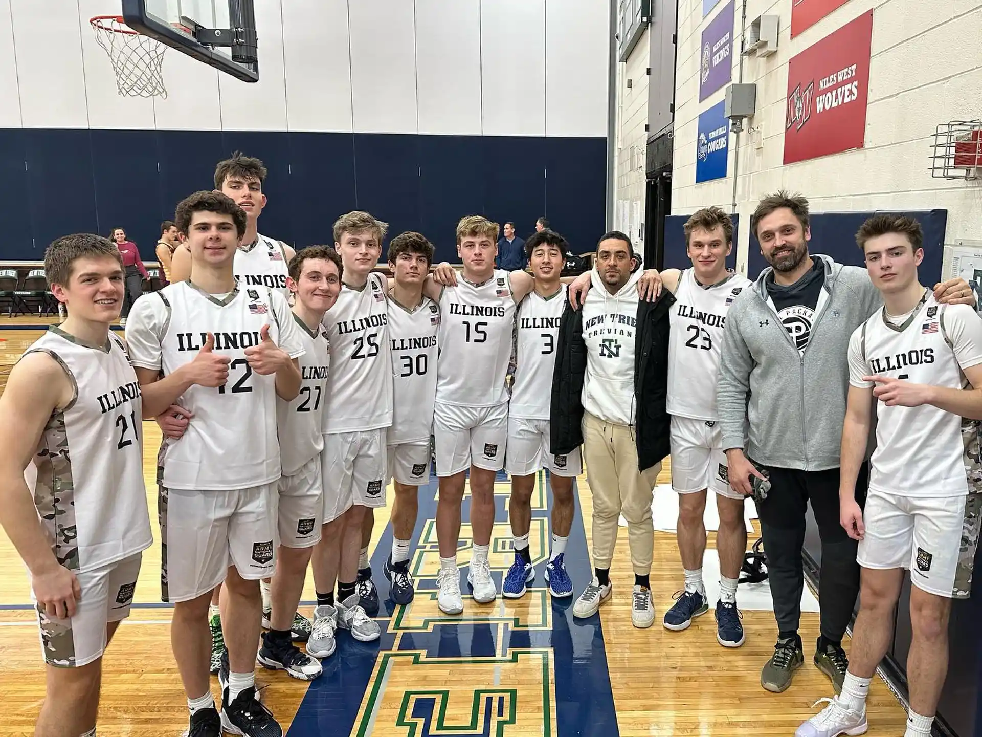 a group of boys in white uniforms