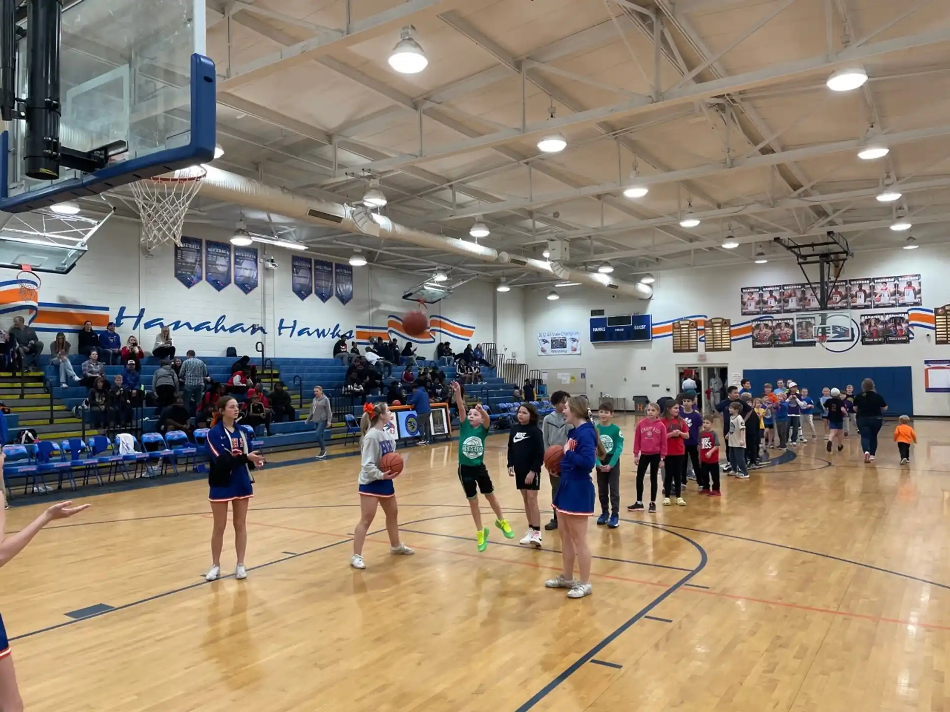 a group of people in a gym