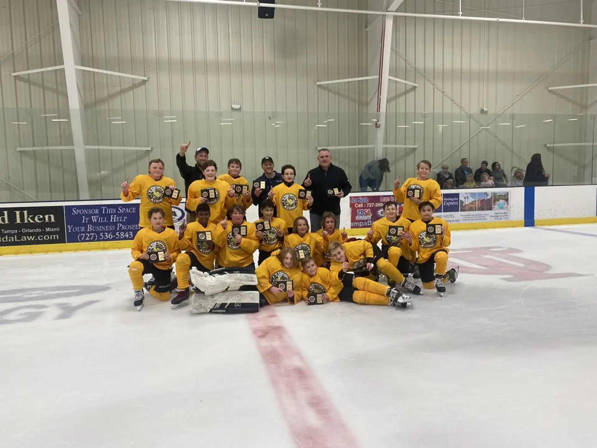 a group of people in hockey uniforms
