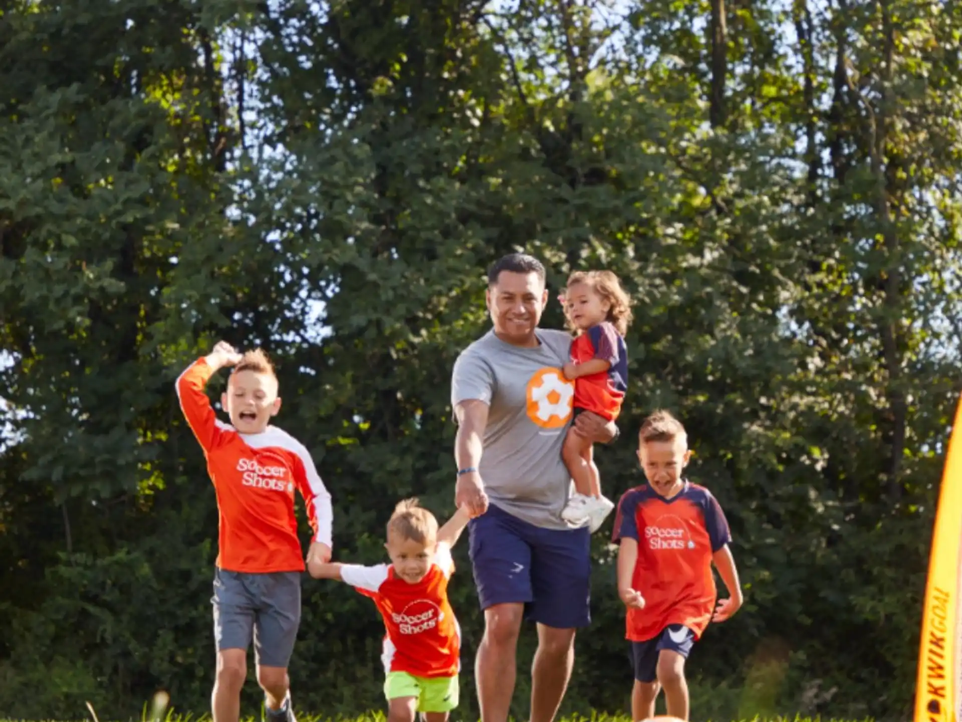 a group of people playing football