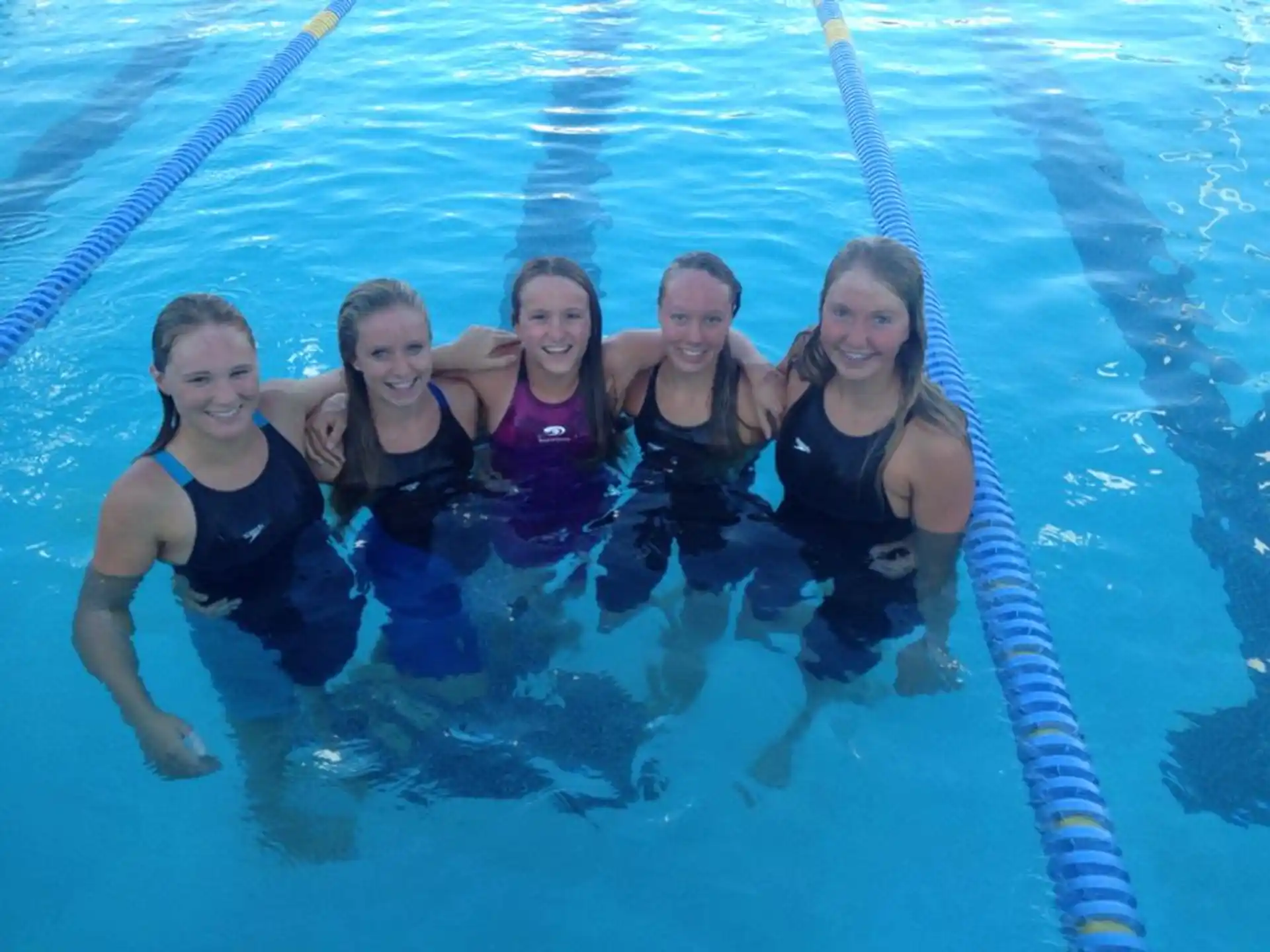 a group of people in a pool