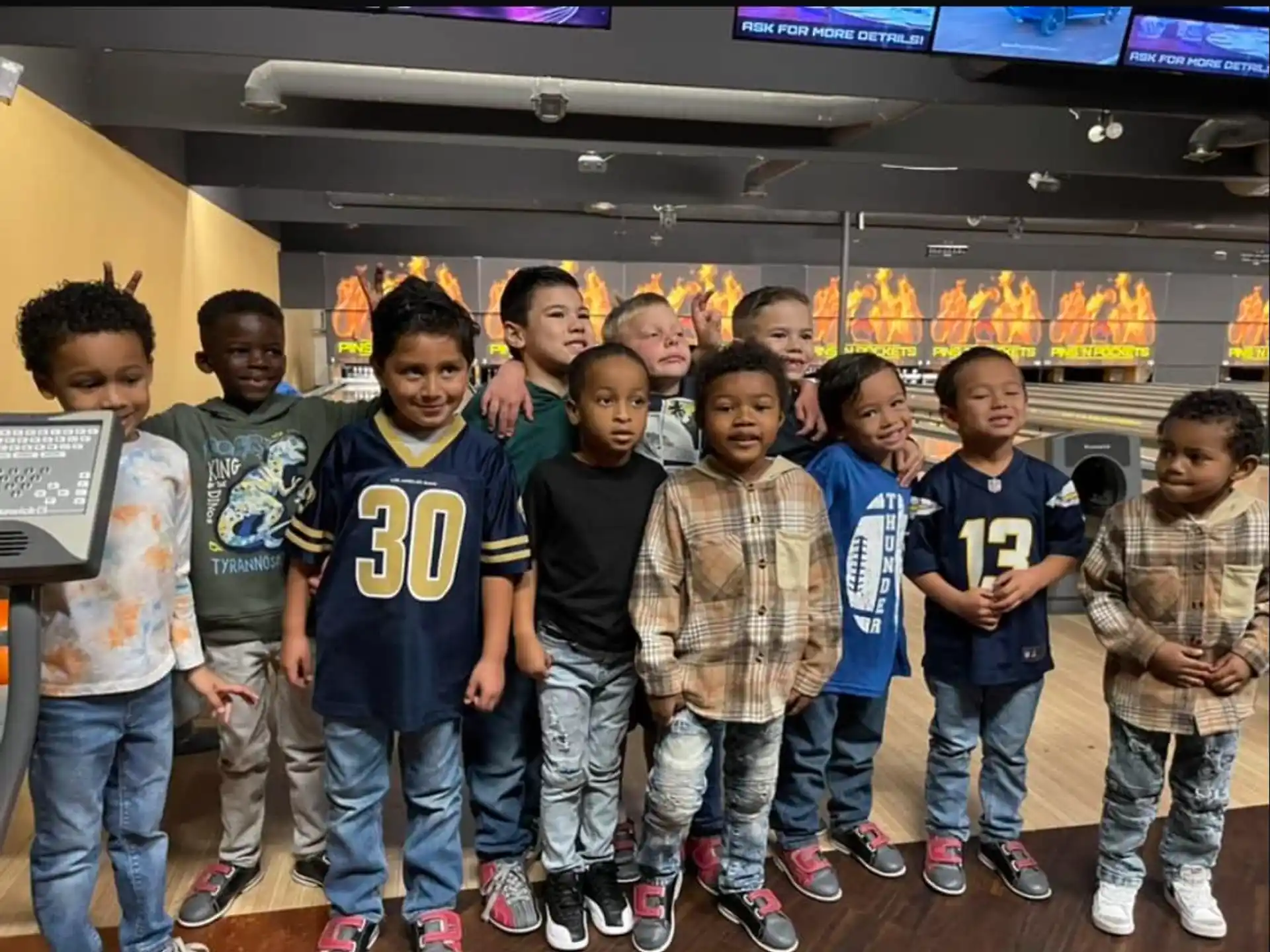 a group of boys posing for a photo