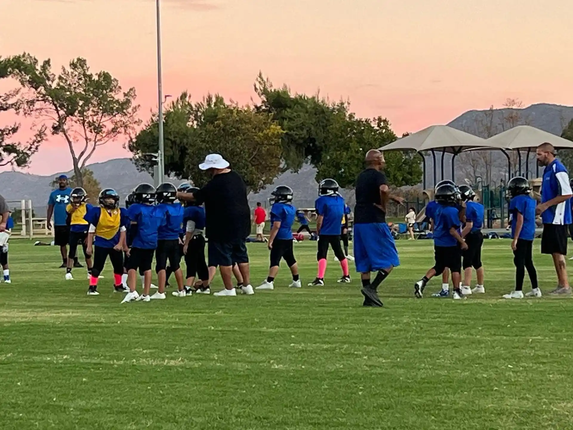 a group of people playing football