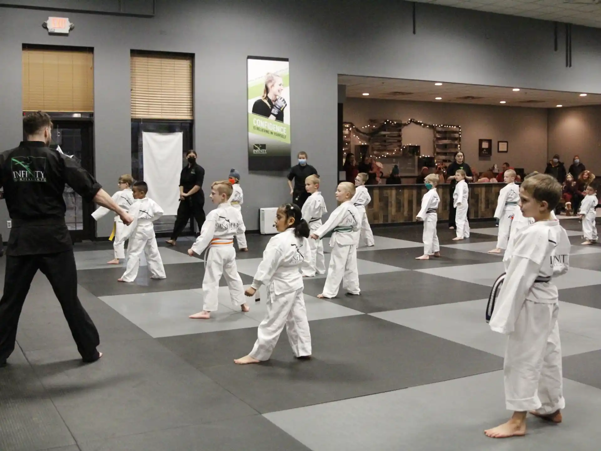 a group of people in karate uniforms