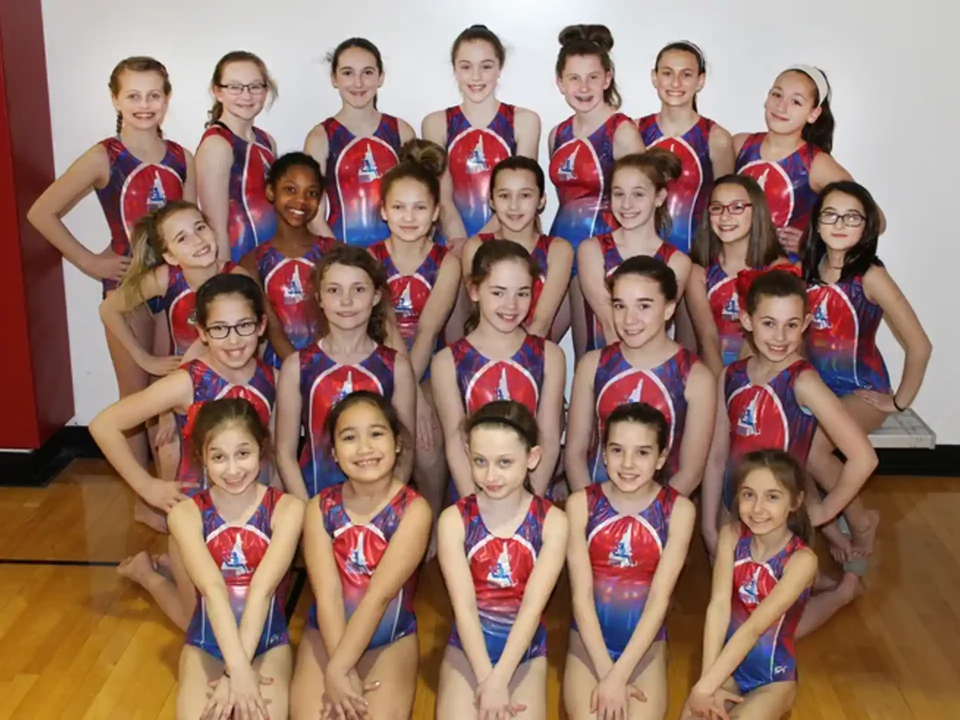 a group of girls posing for a photo