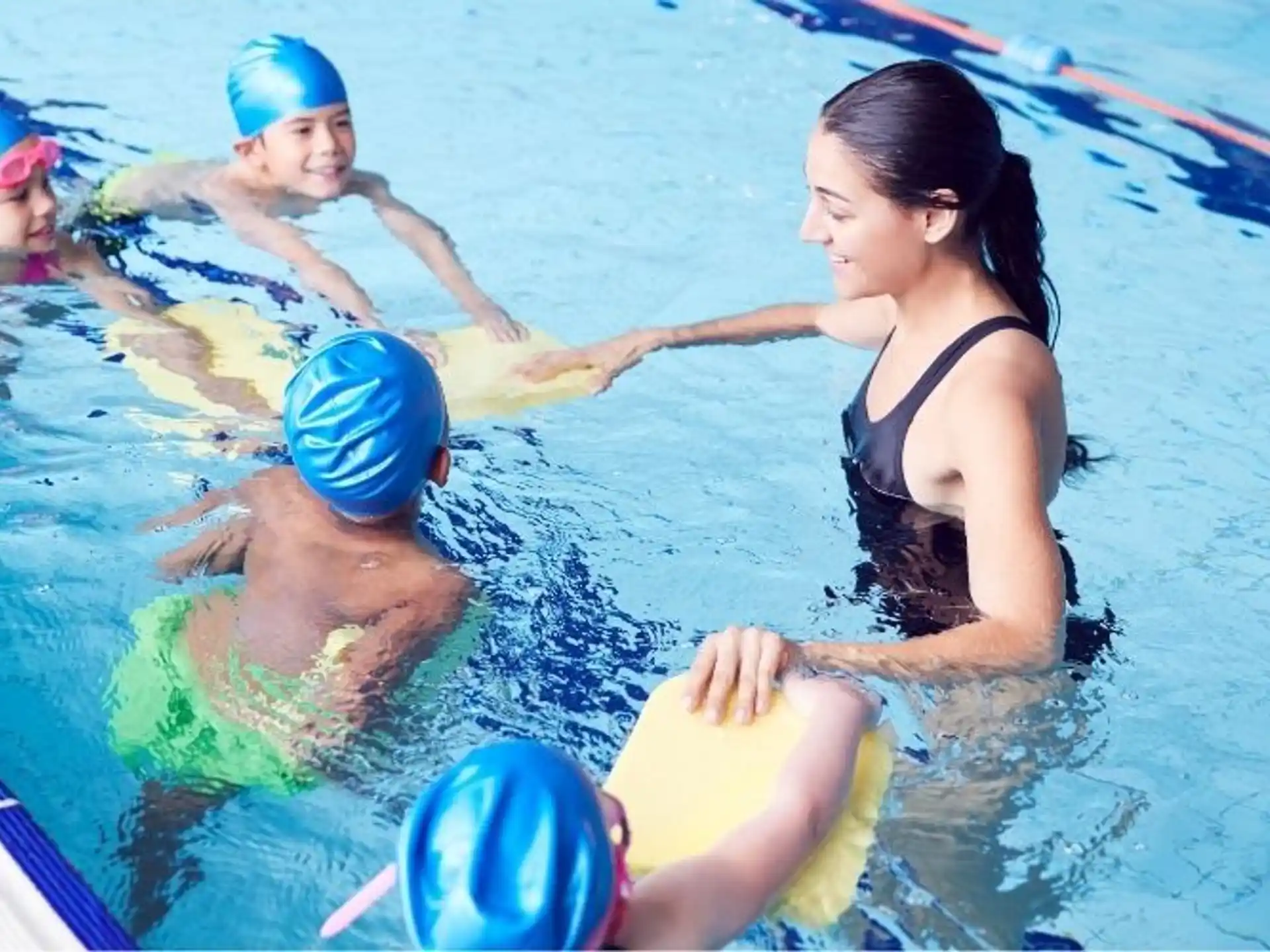 a group of people in a pool