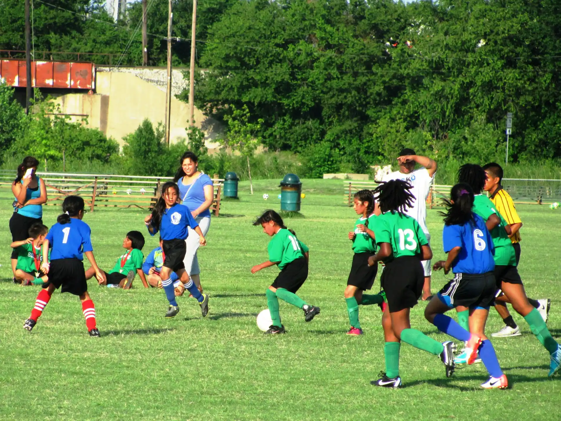 a group of girls playing football