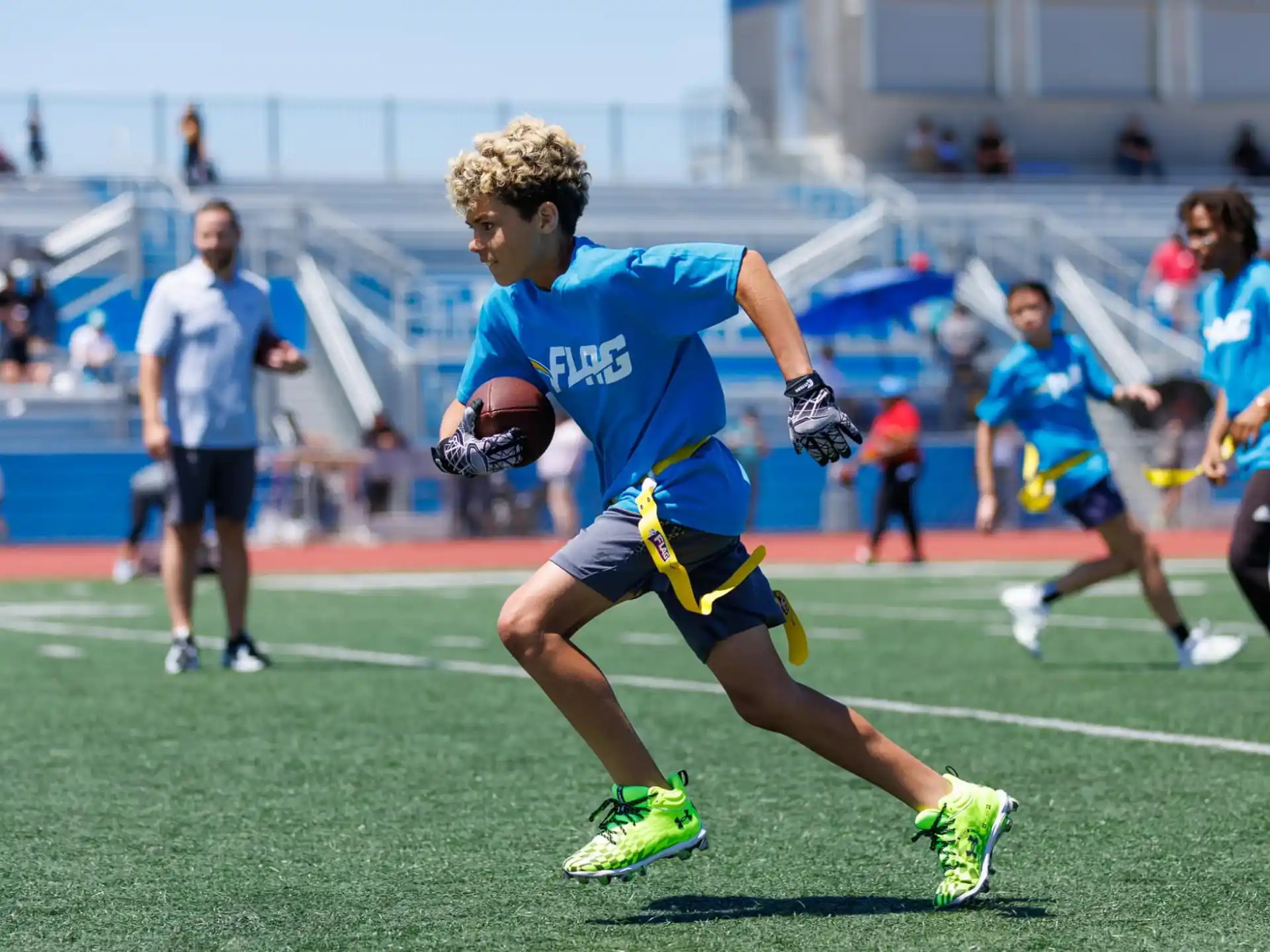 a boy running on a field