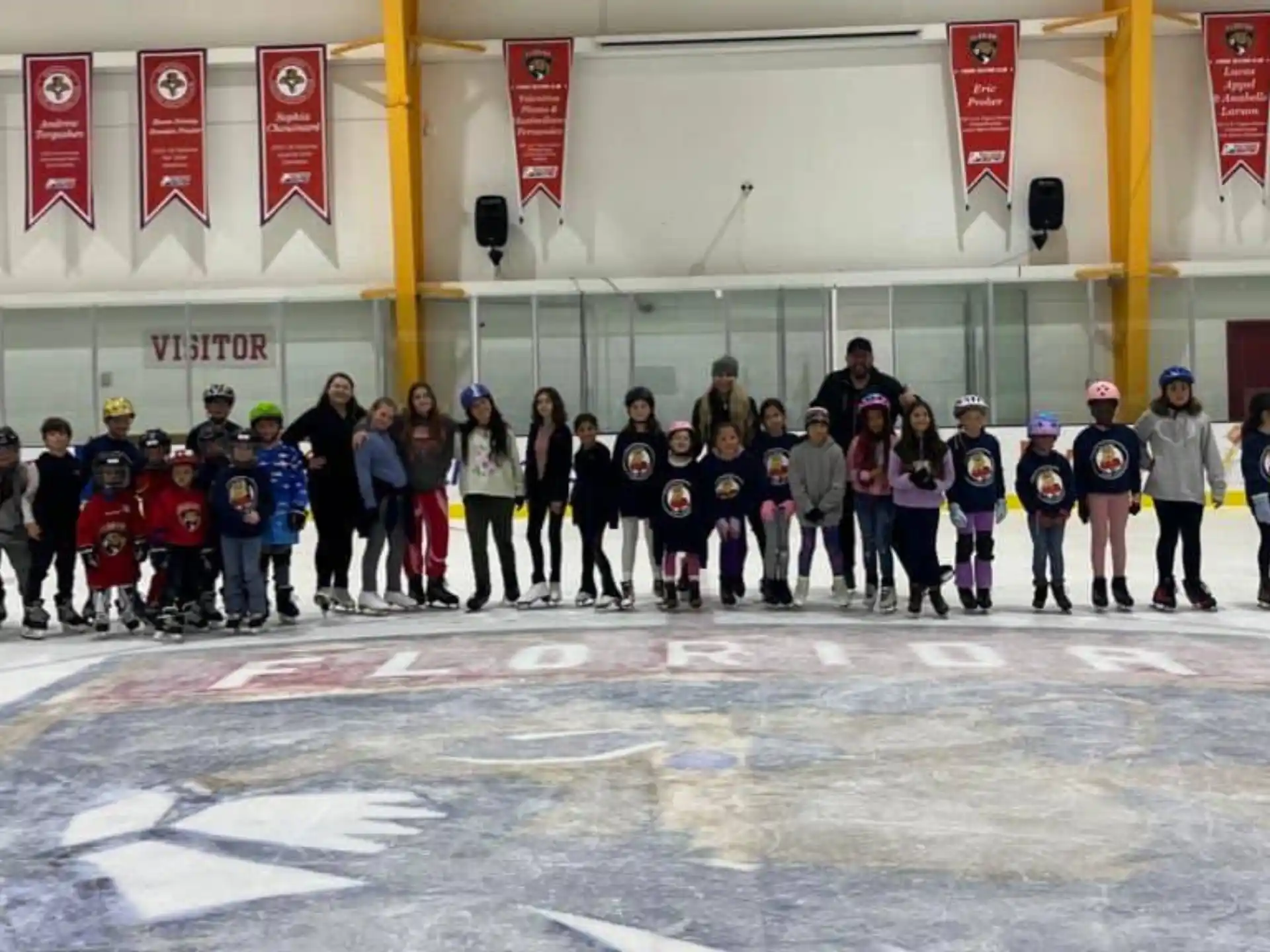 a group of people standing on ice