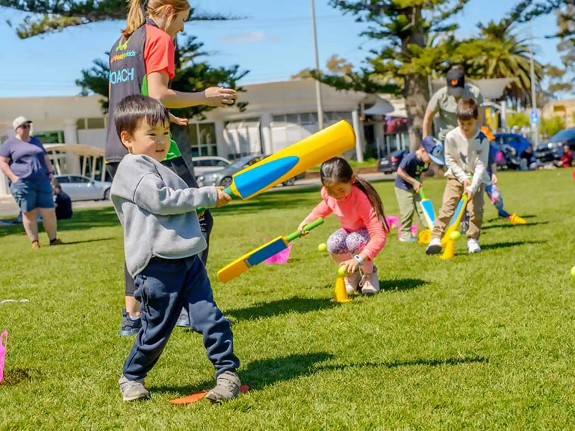 kids playing with a bat