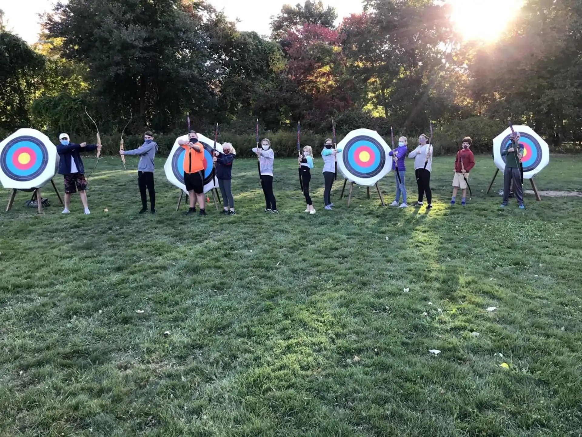 a group of people holding shields