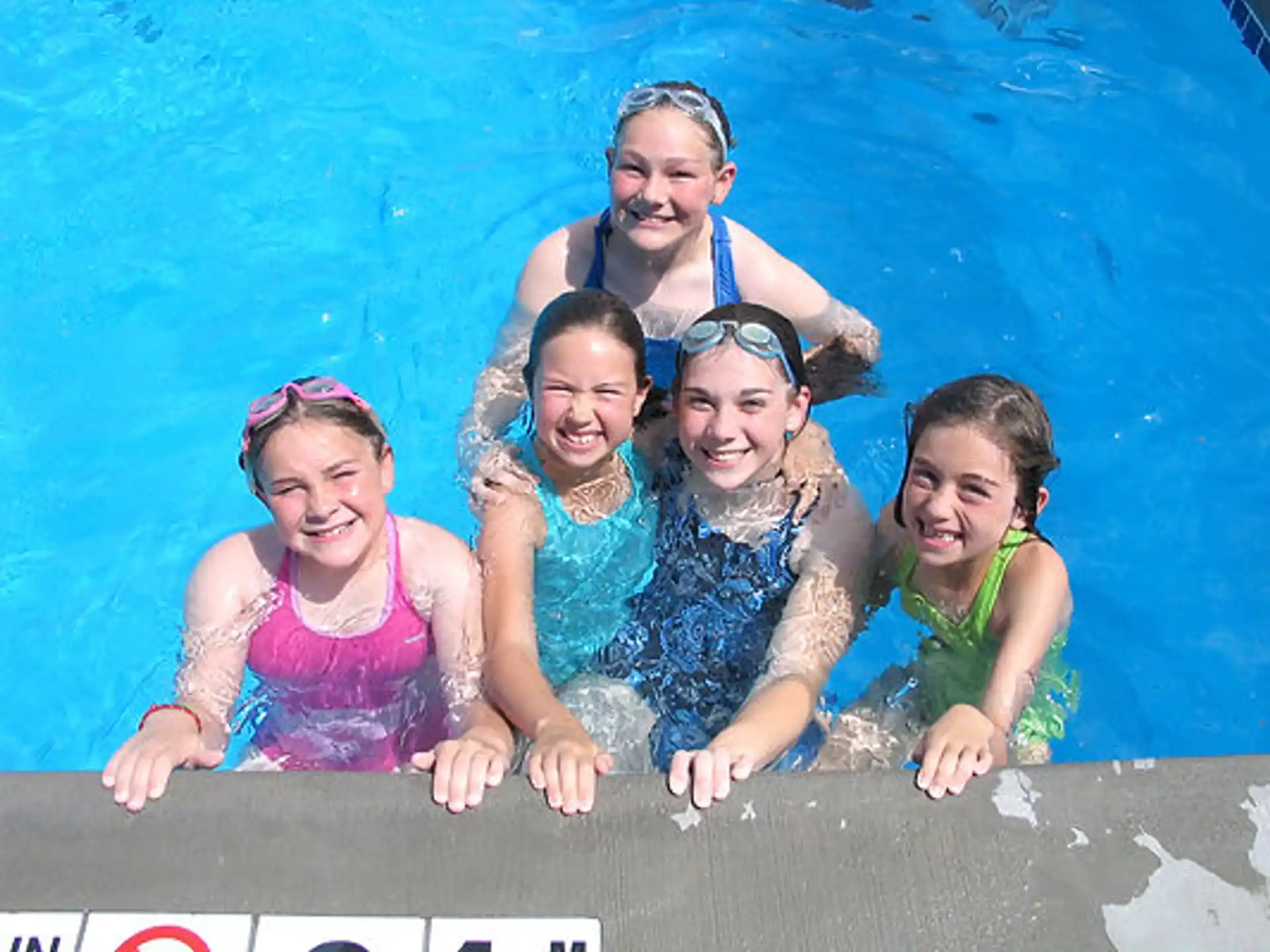 a group of people in a pool