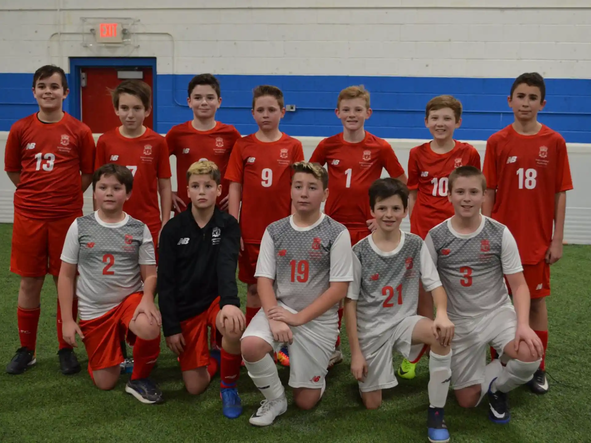 a group of boys posing for a picture