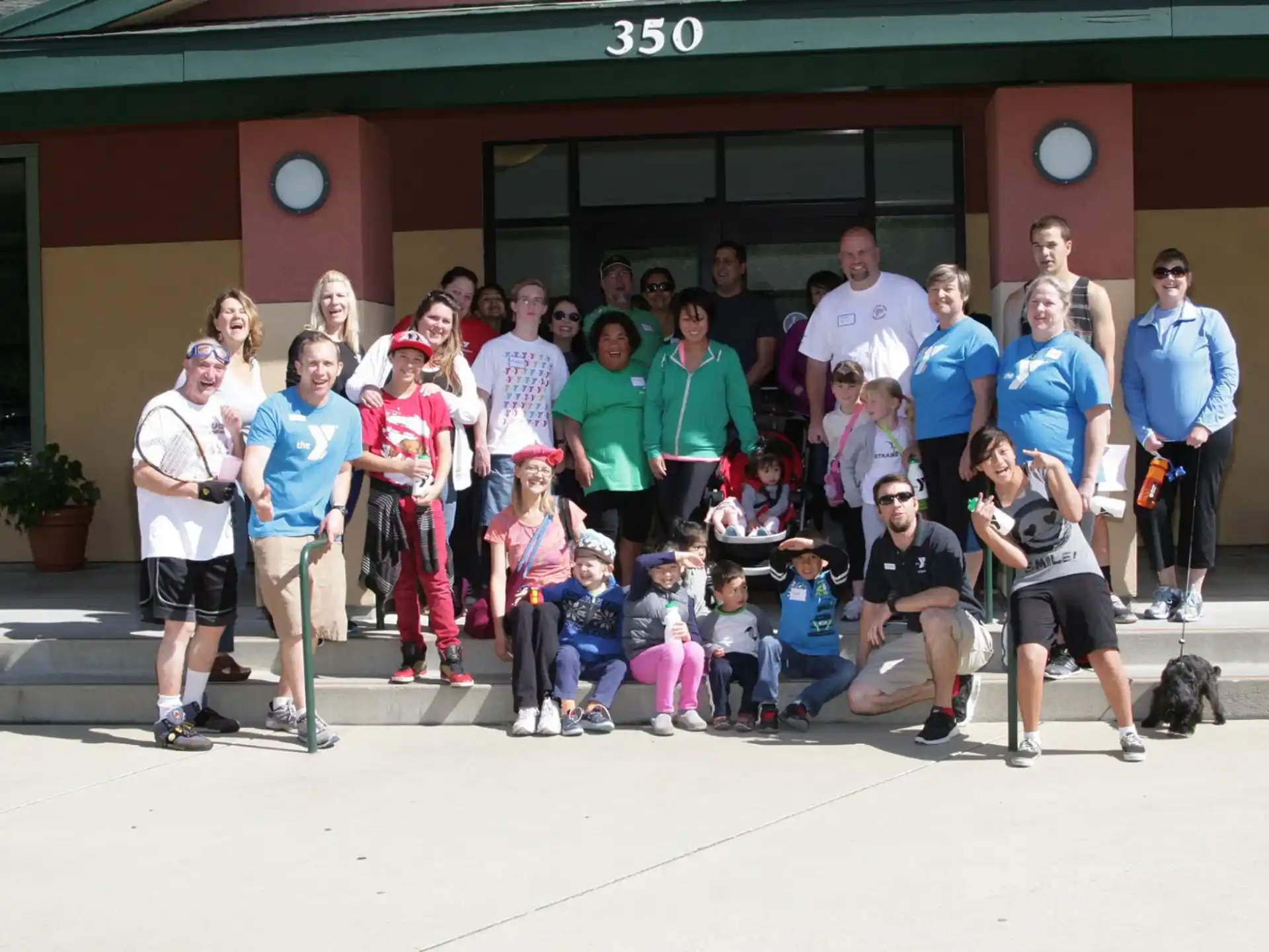 a group of people posing for a photo