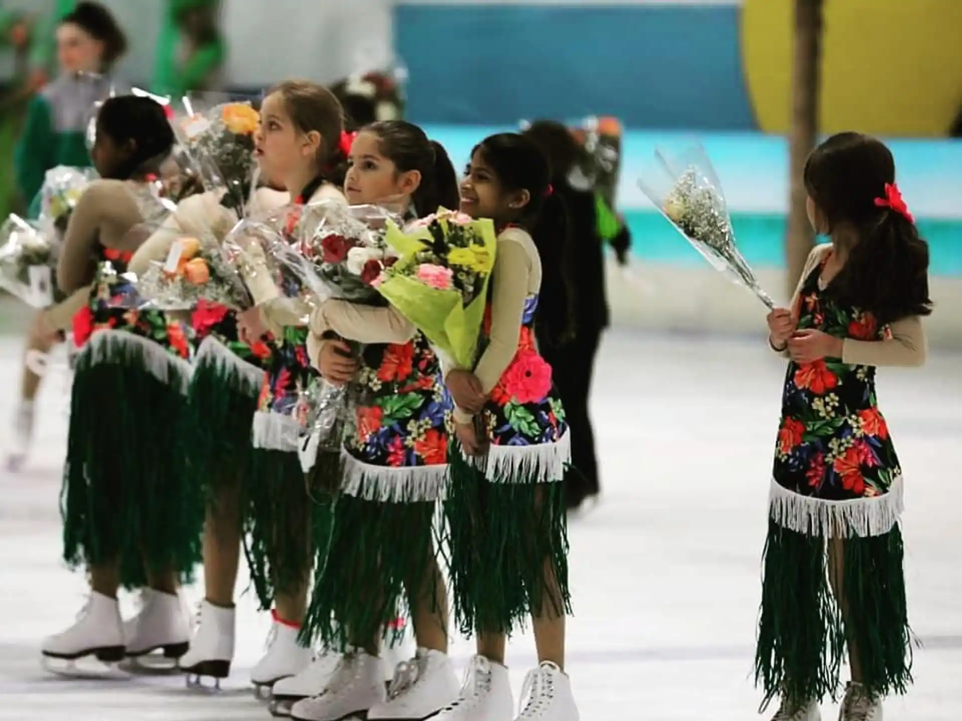 a group of girls in traditional dress