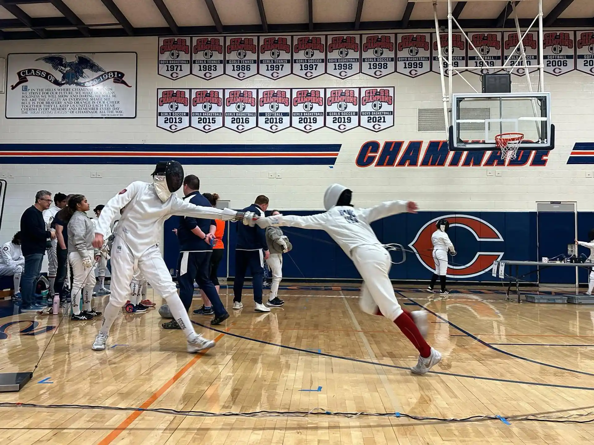 a group of people in a gym