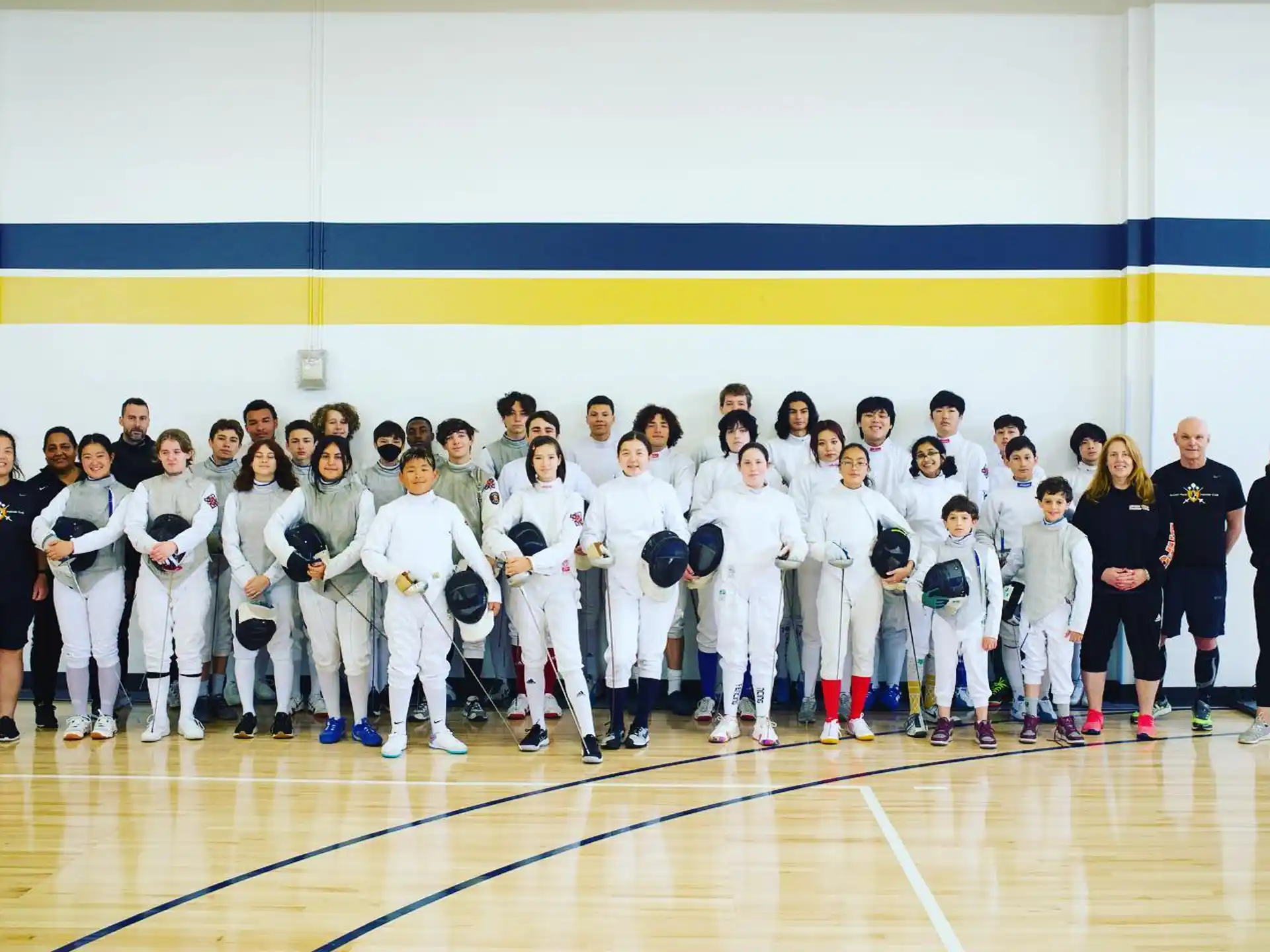 a group of people in white uniforms