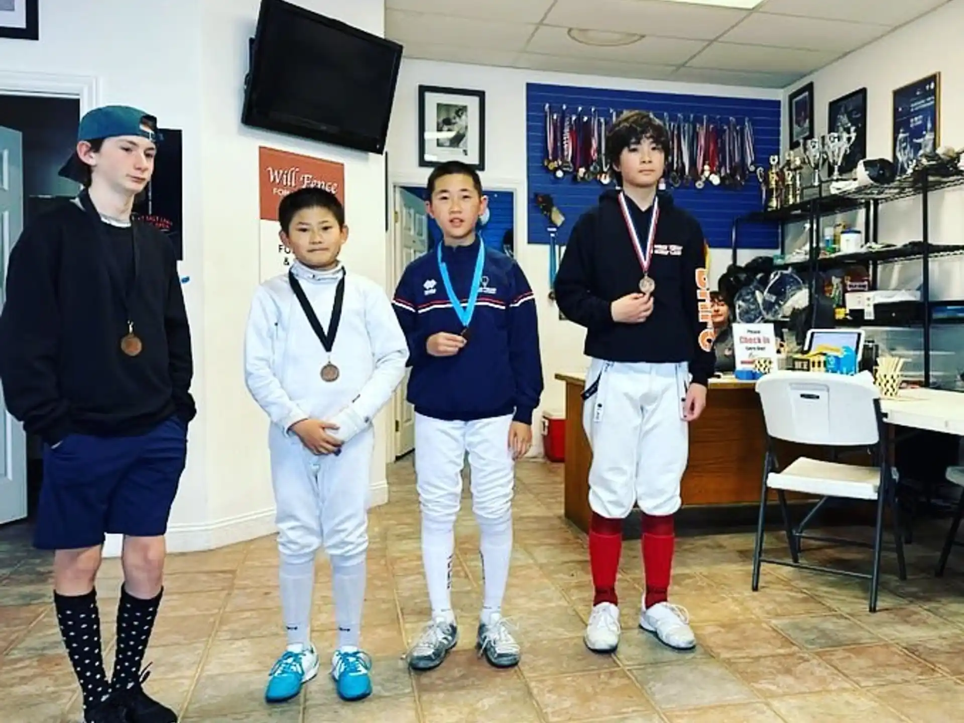a group of people wearing medals