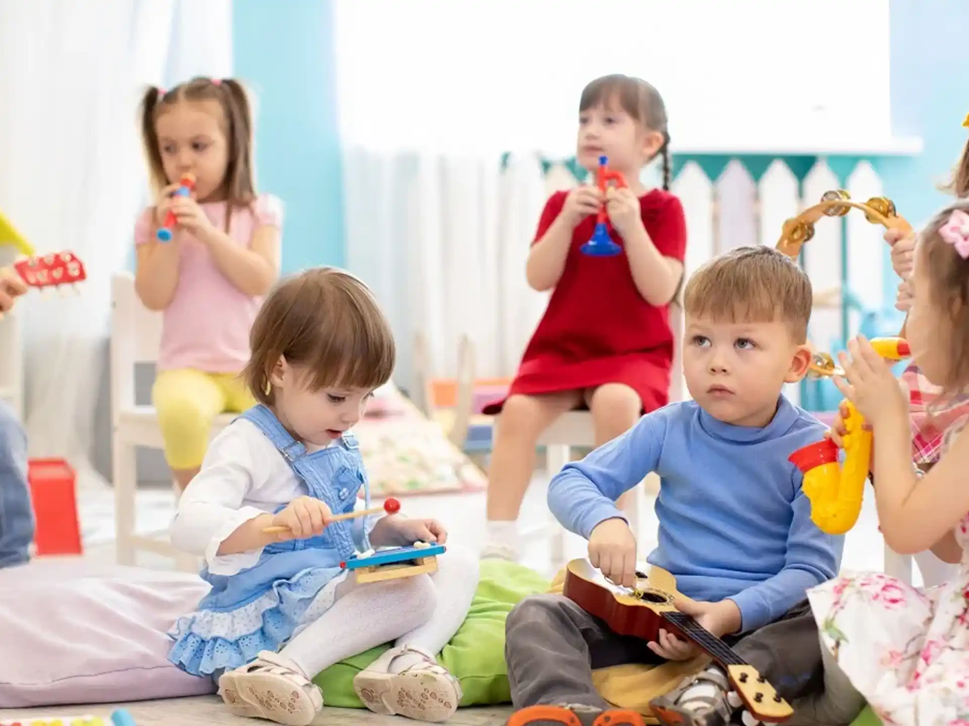 a group of children sitting on the floor