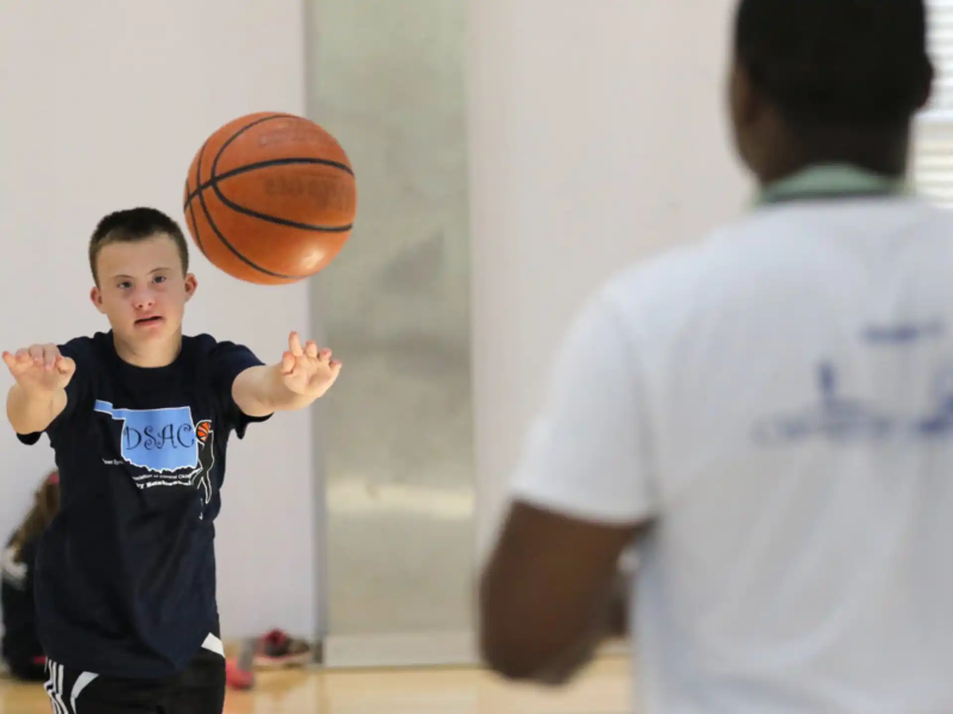 a boy with a basketball