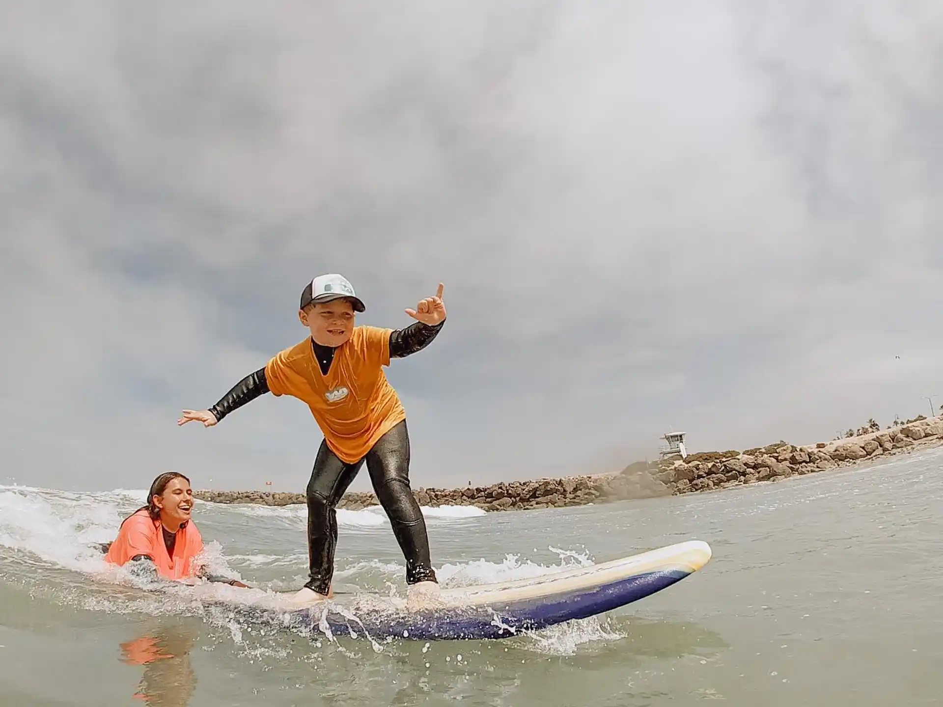 a man riding a surfboard
