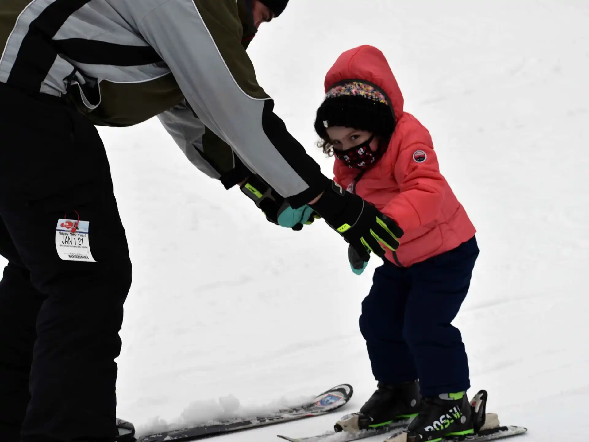 a kid skiing on the snow